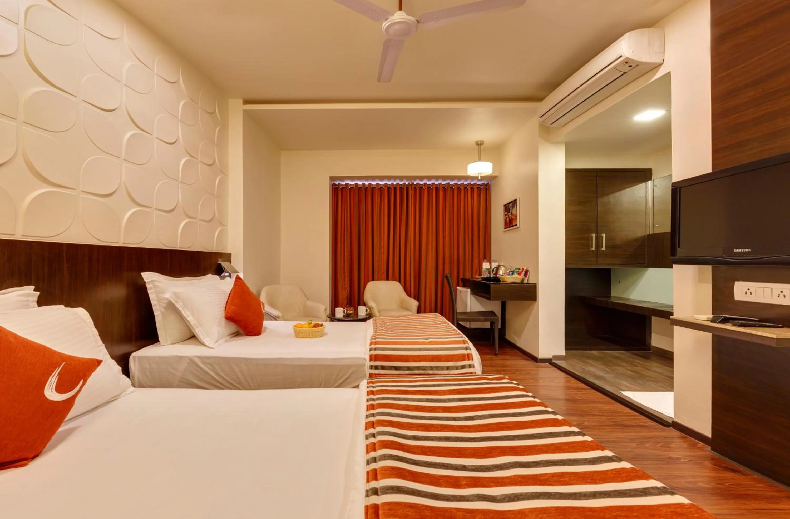 Deluxe Twin Room - single occupancy in Regenta Place Raysons Kolhapur