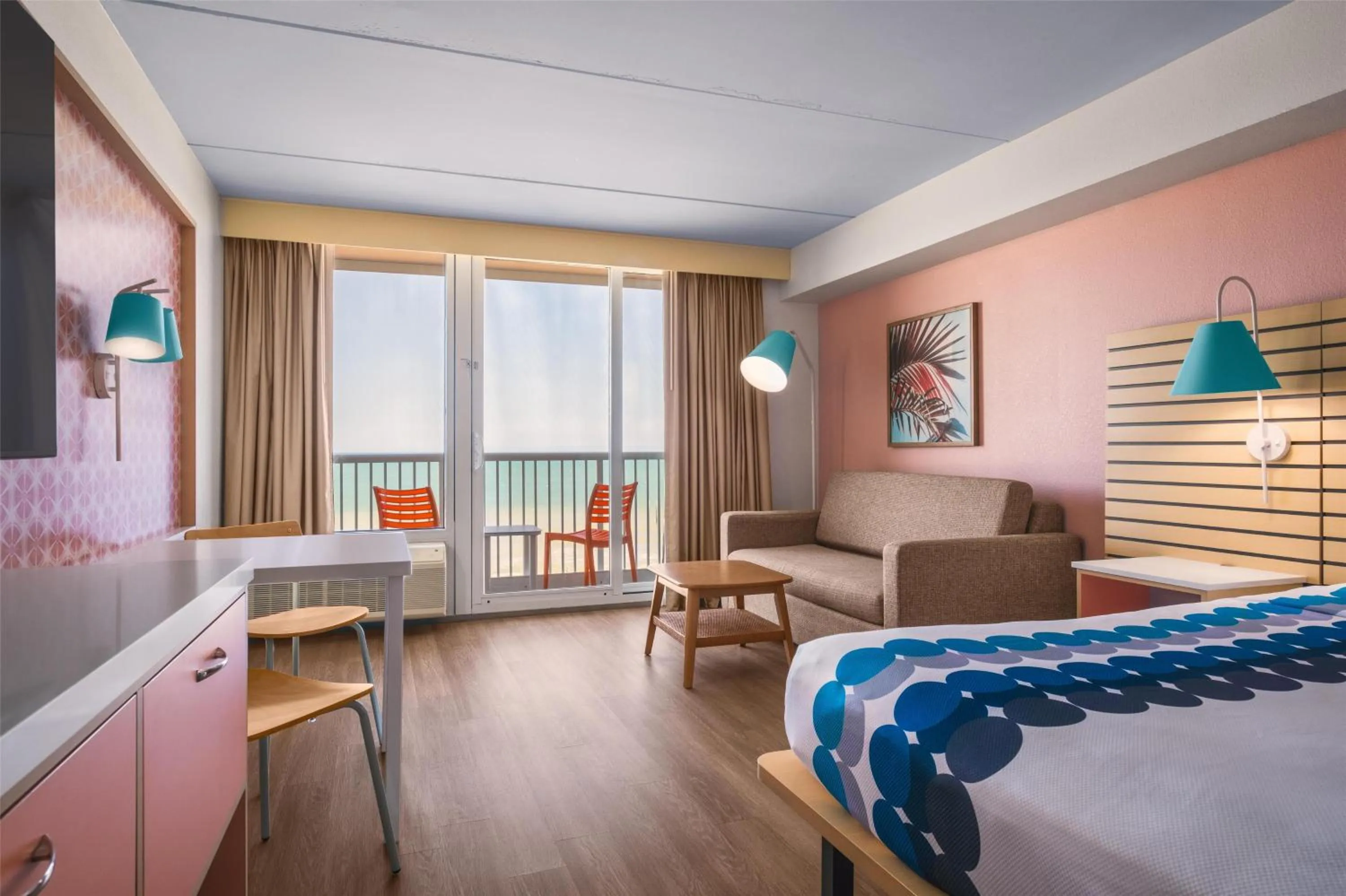 Family Room with One King Bed, One Queen Bed, Twin Bunk Beds and Oceanfront View in Golden Sands Carolina Beach Oceanfront, Tapestry by Hilton