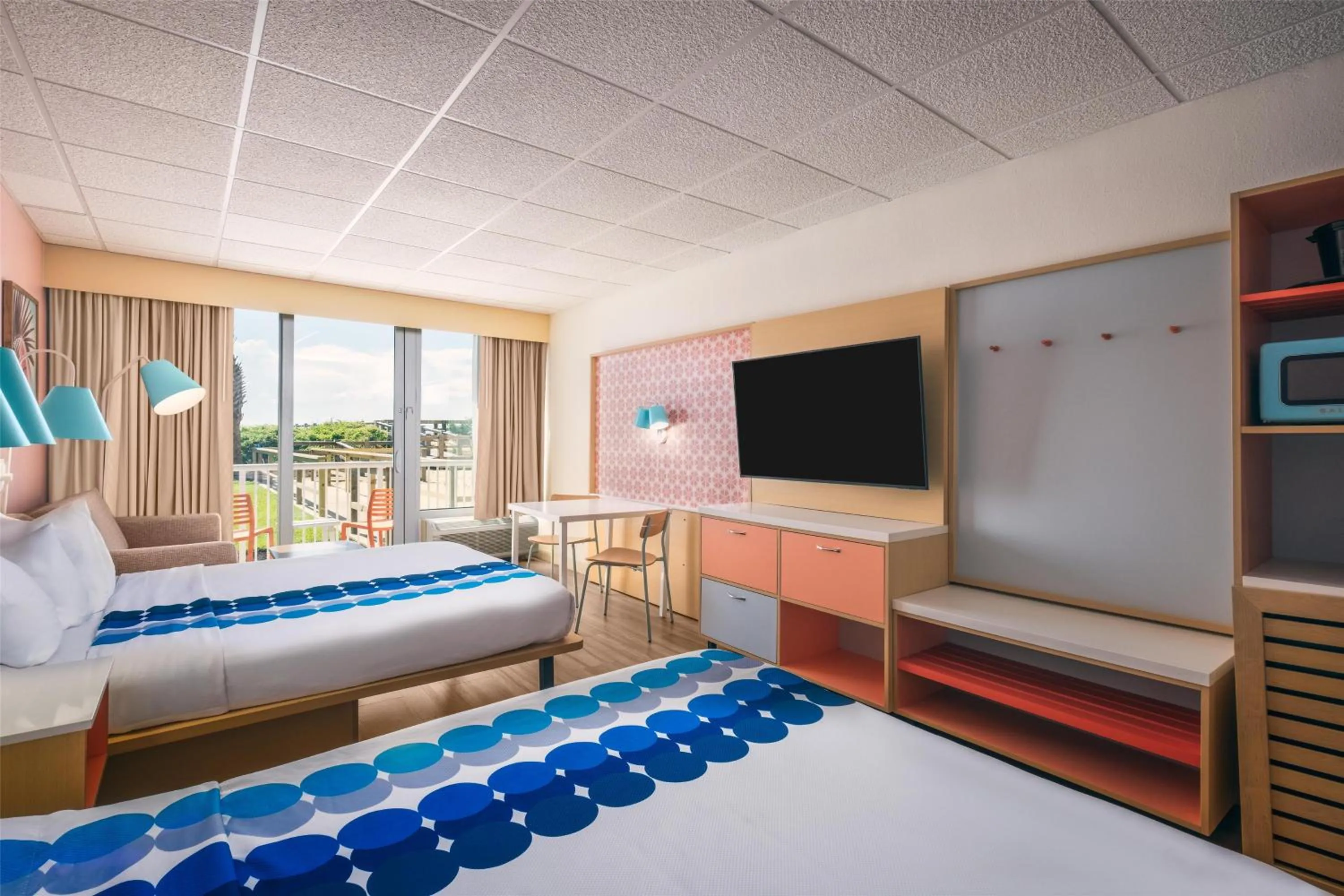 Queen Room with Two Queen Beds and Partial Ocean View in Golden Sands Carolina Beach Oceanfront, Tapestry by Hilton