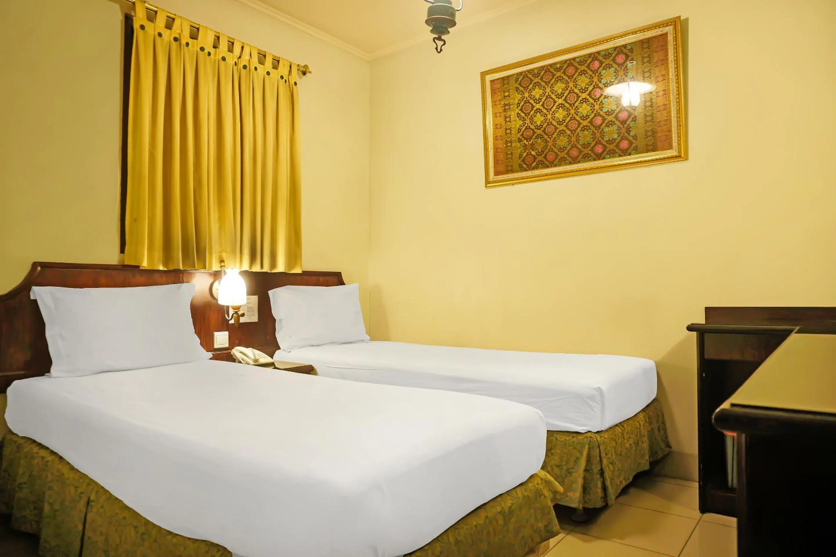 Standard Twin Room in Collection O 92690 Hotel Limas