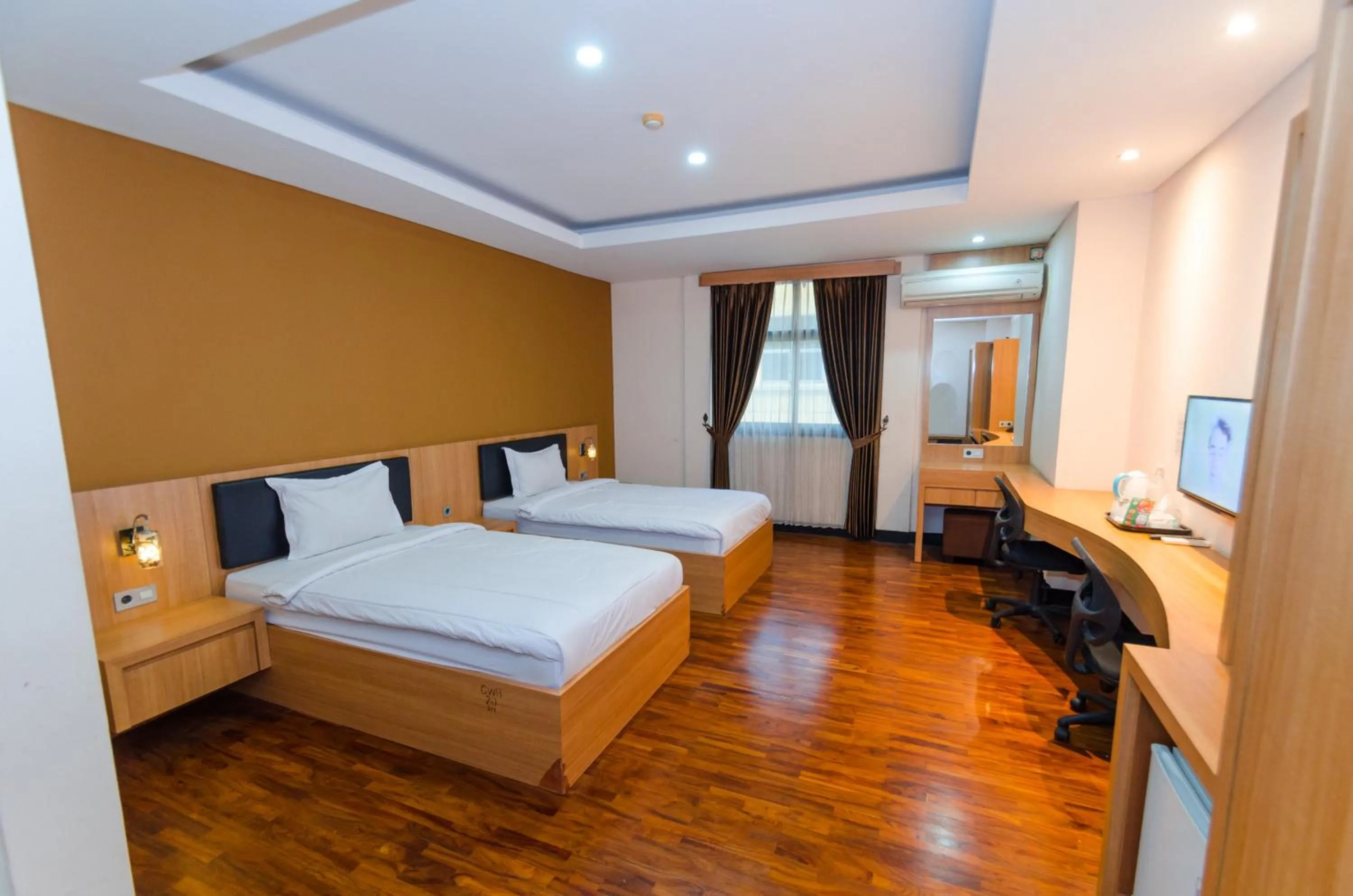 Twin Room with City View in Graha Widya Bhakti at STIESIA Surabaya