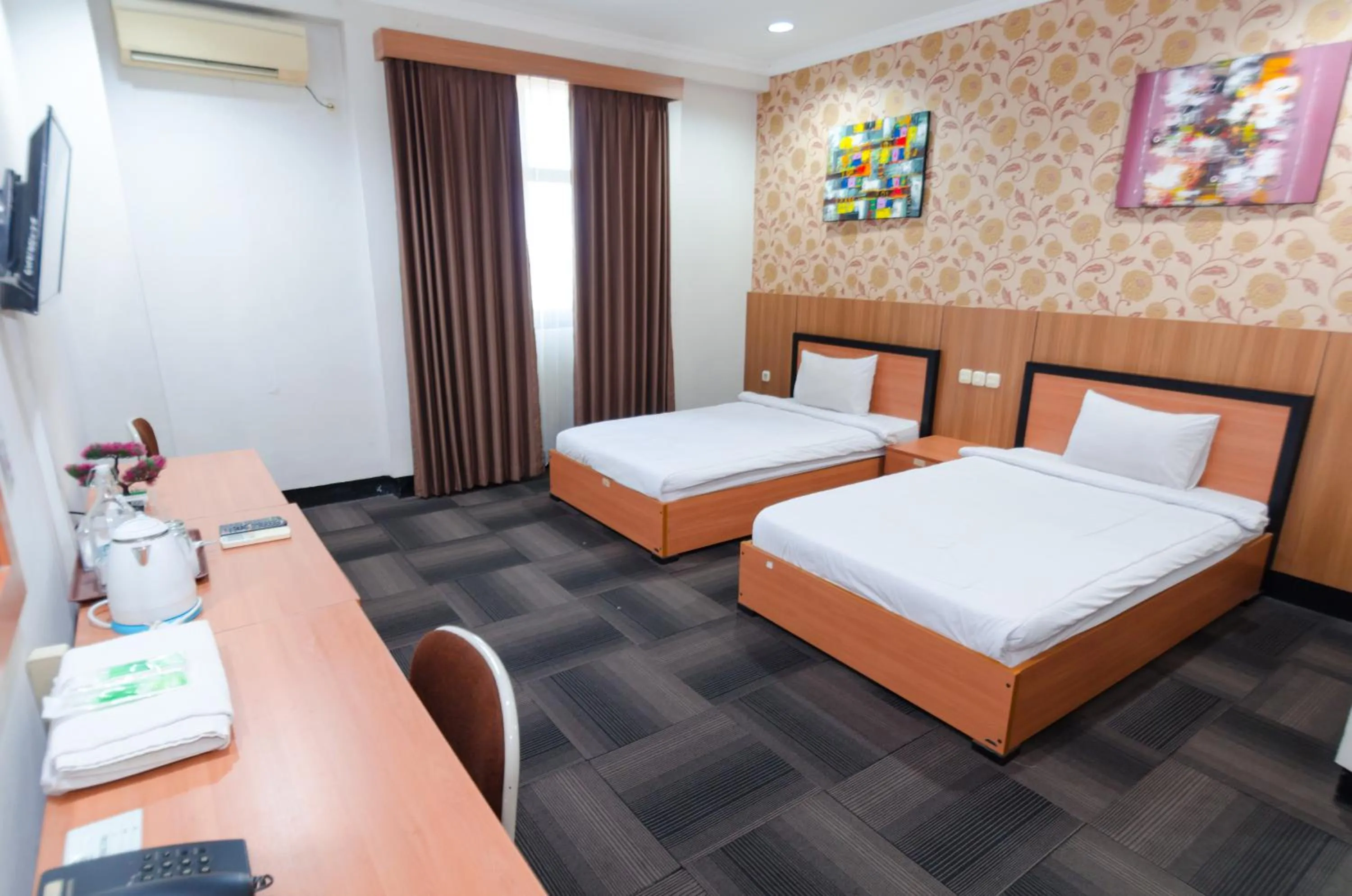 Deluxe Twin Room in Graha Widya Bhakti at STIESIA Surabaya