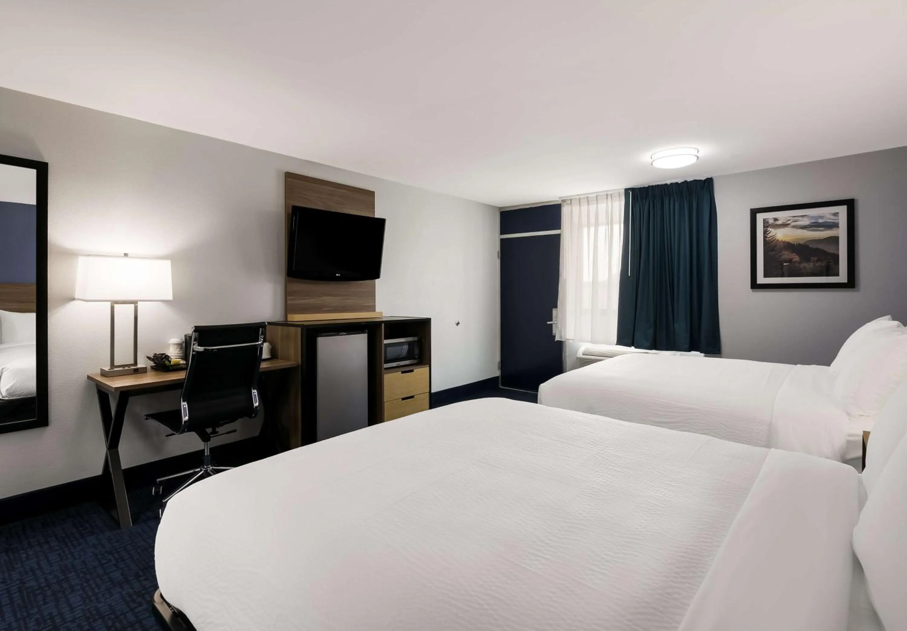Queen Rooms with Two Queen Beds - Non-Smoking in SureStay Plus by Best Western Pigeon Forge