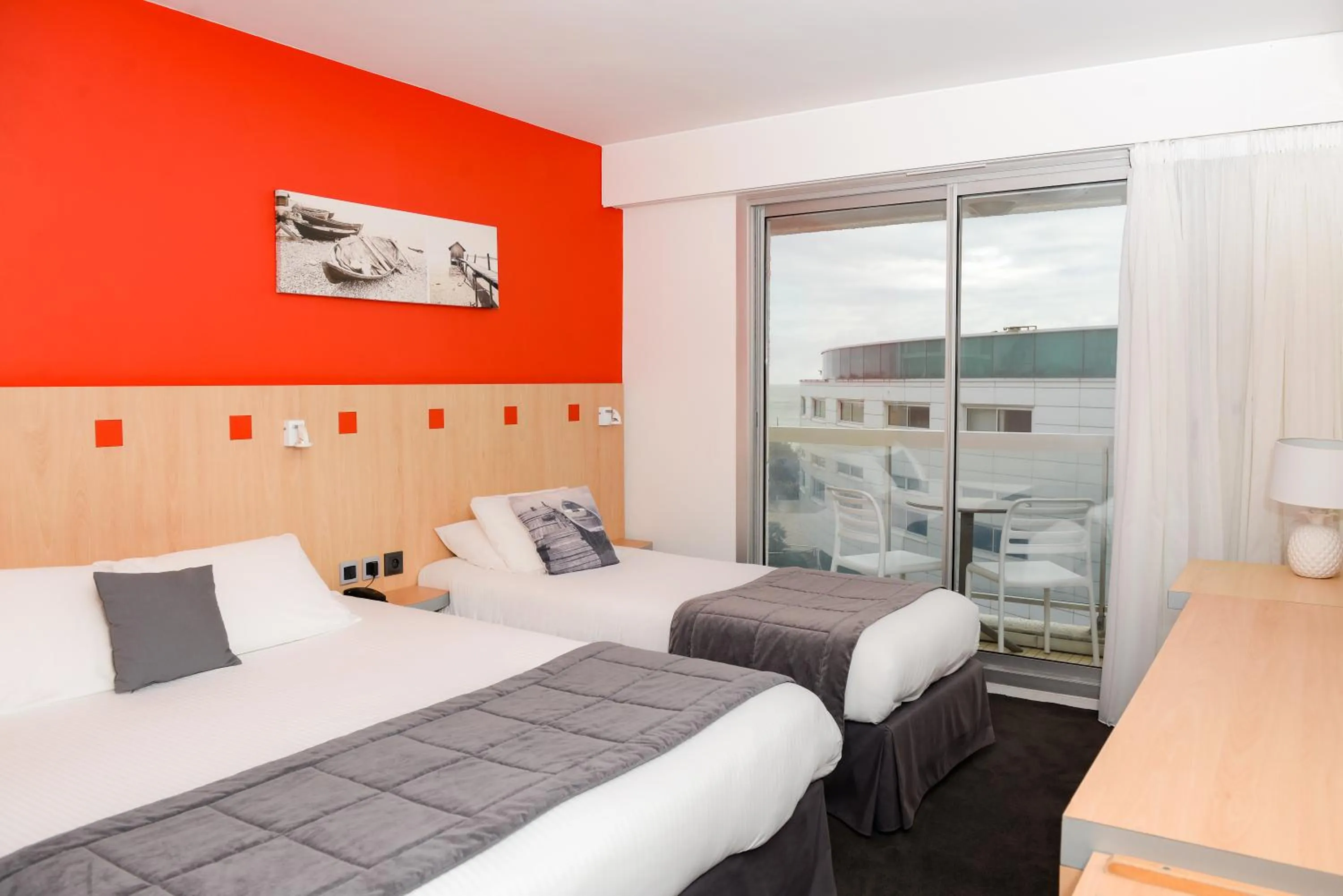 Superior Triple Room with Partial Sea View in Kyriad Prestige Les Sables d'Olonne - Plage - Centre des Congrès