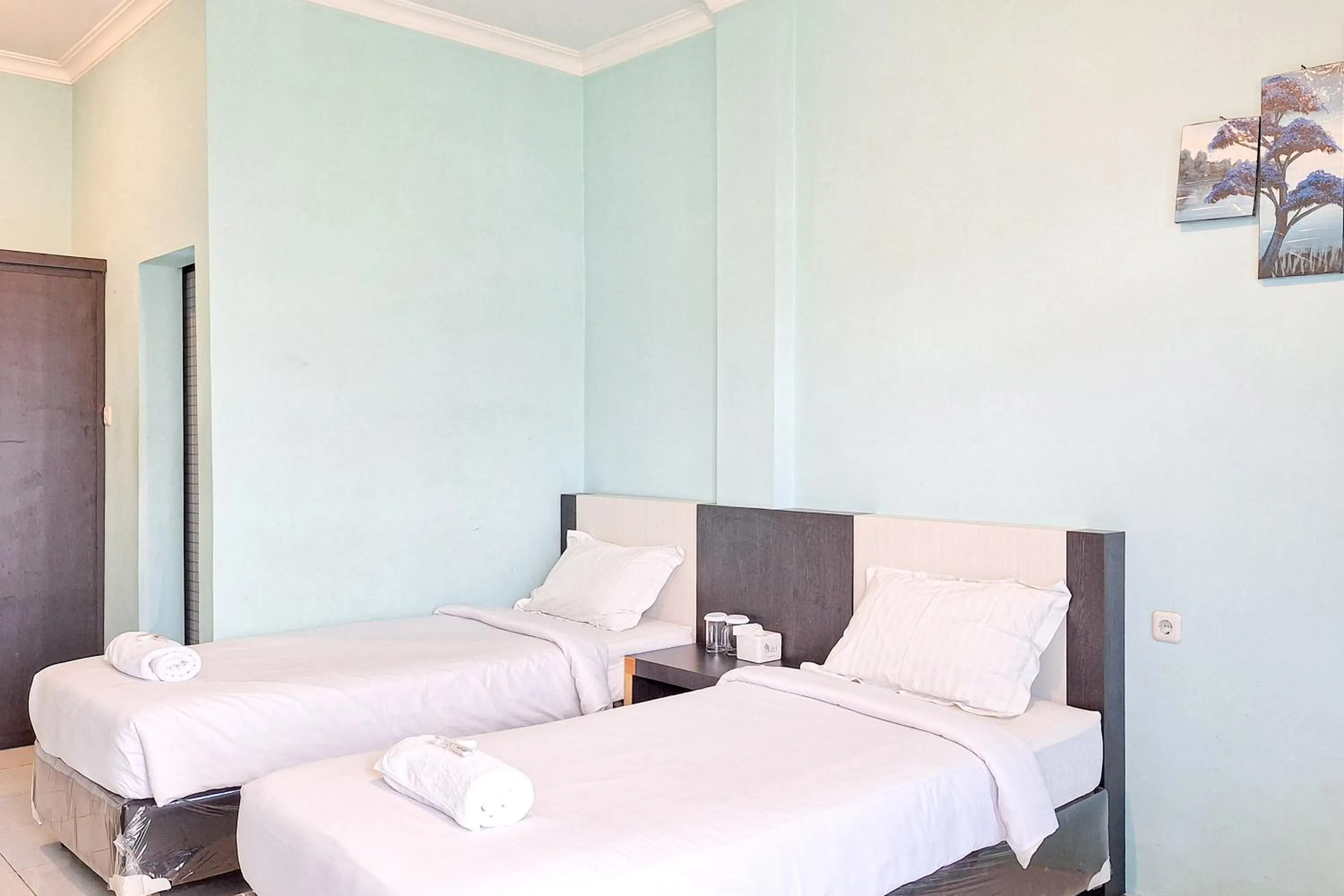 Standard Twin Room in Homestay Dalimo 2 Syariah Payakumbuh RedPartner