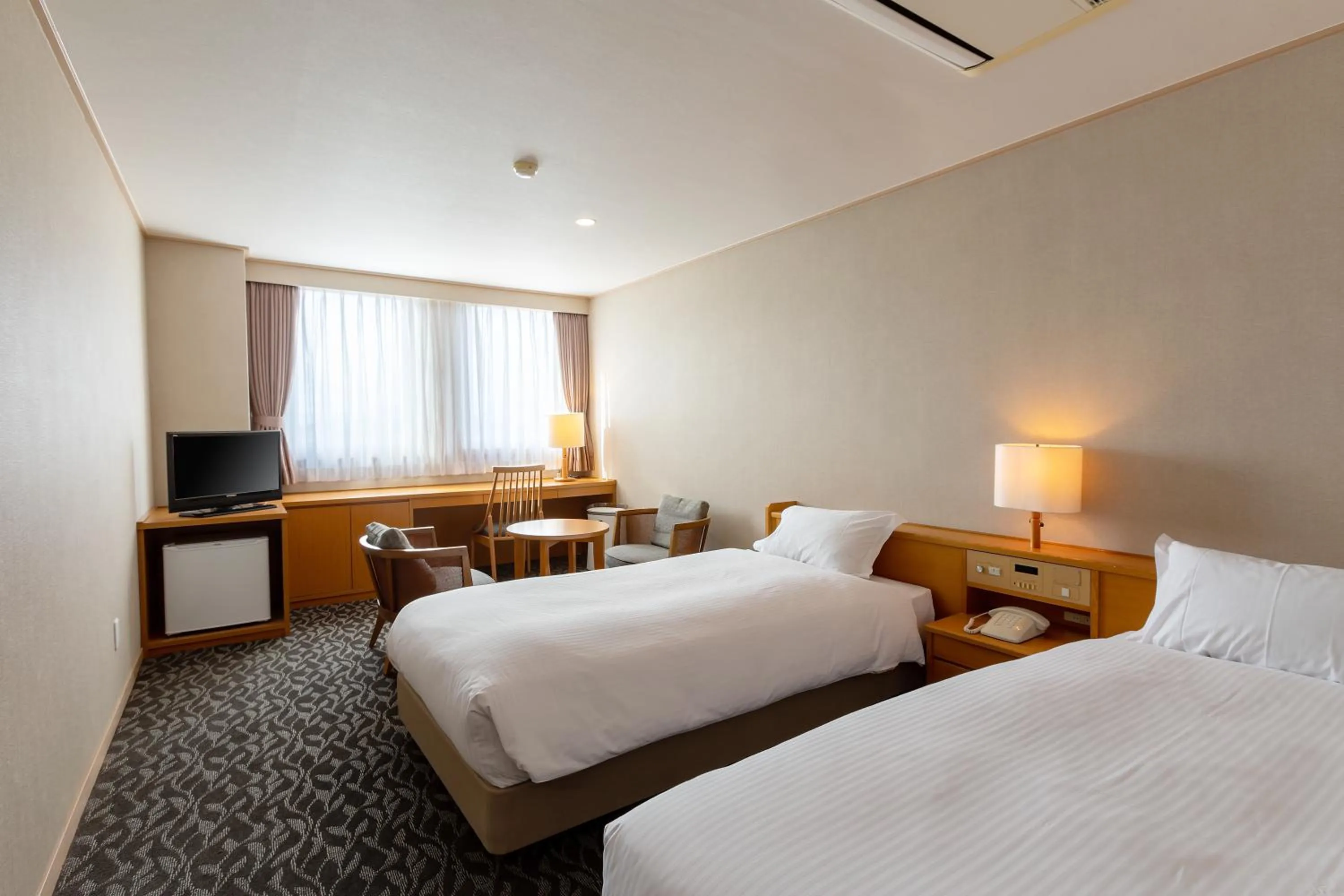 Standard Twin Room - single occupancy in Suikouen Hotel
