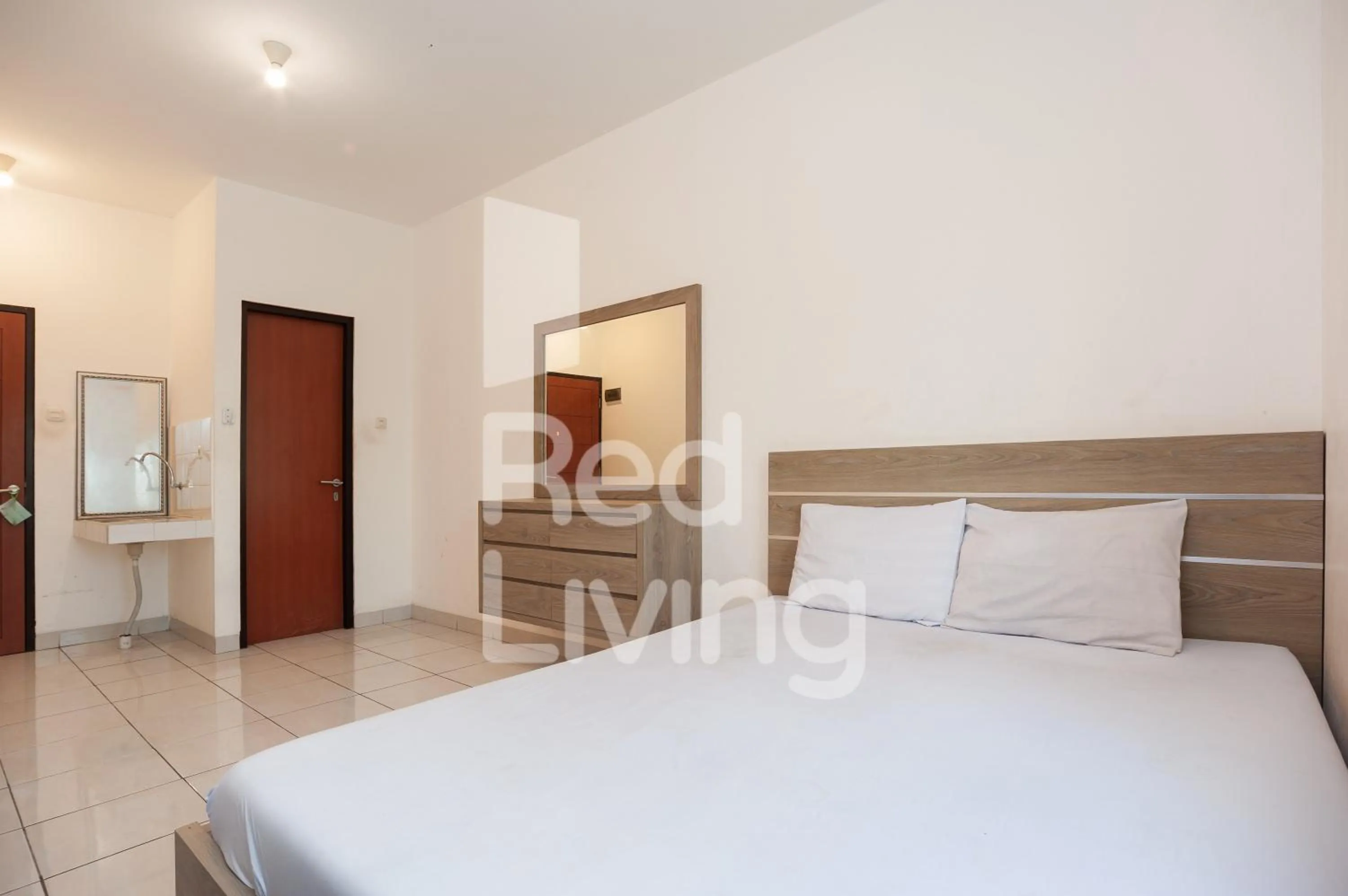 Studio - single occupancy in RedLiving Apartemen RQ at Ecohome Citra Raya