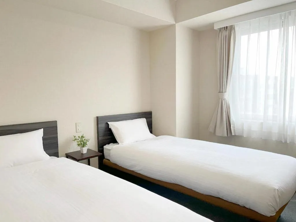 Superior Twin Room in CHECKinn Osaka Shinimamiya