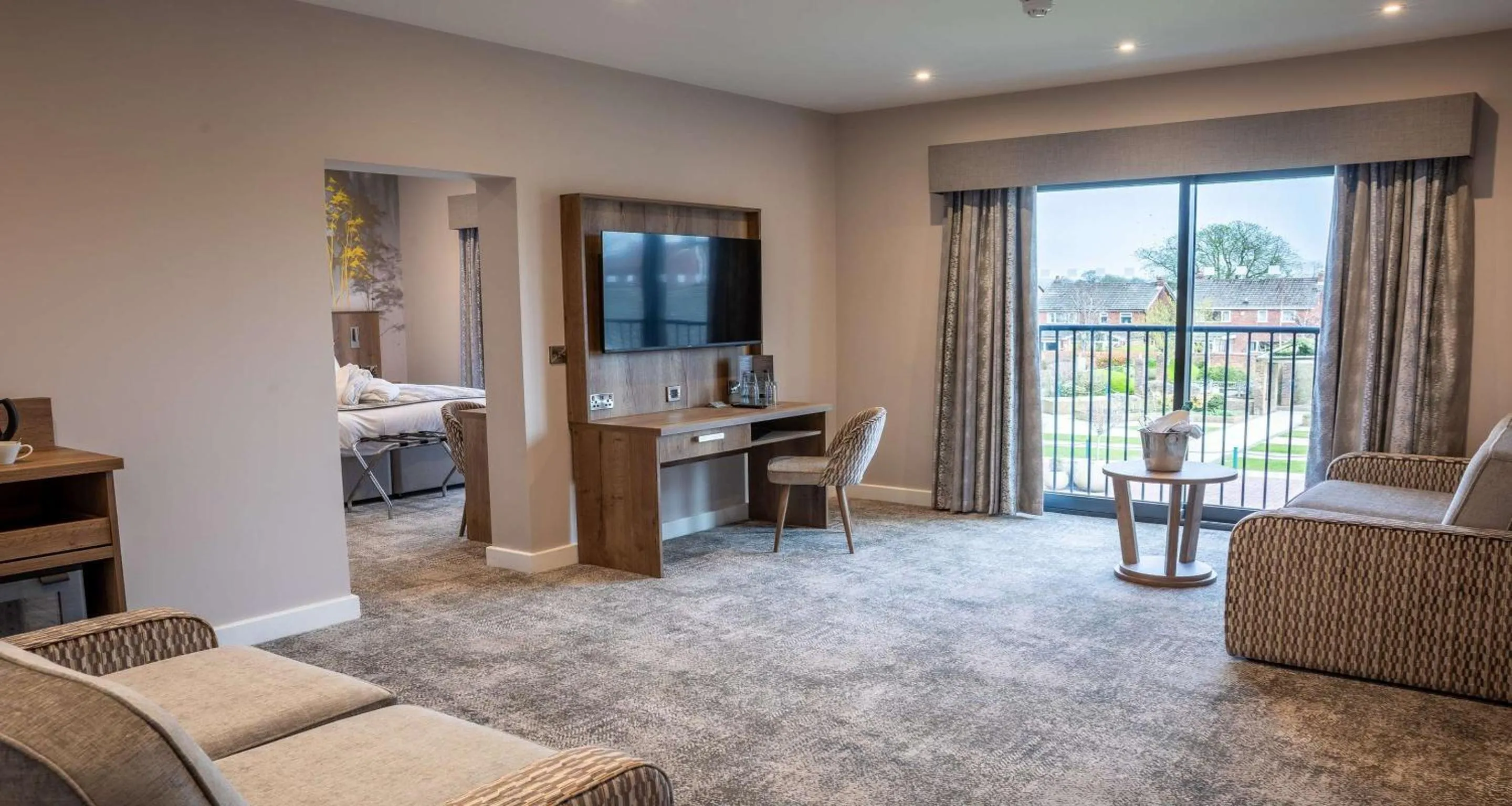 King Suite with Bath Tub in Room and Balcony - Garden View in Barton Manor Hotel & Spa; BW Signature Collection