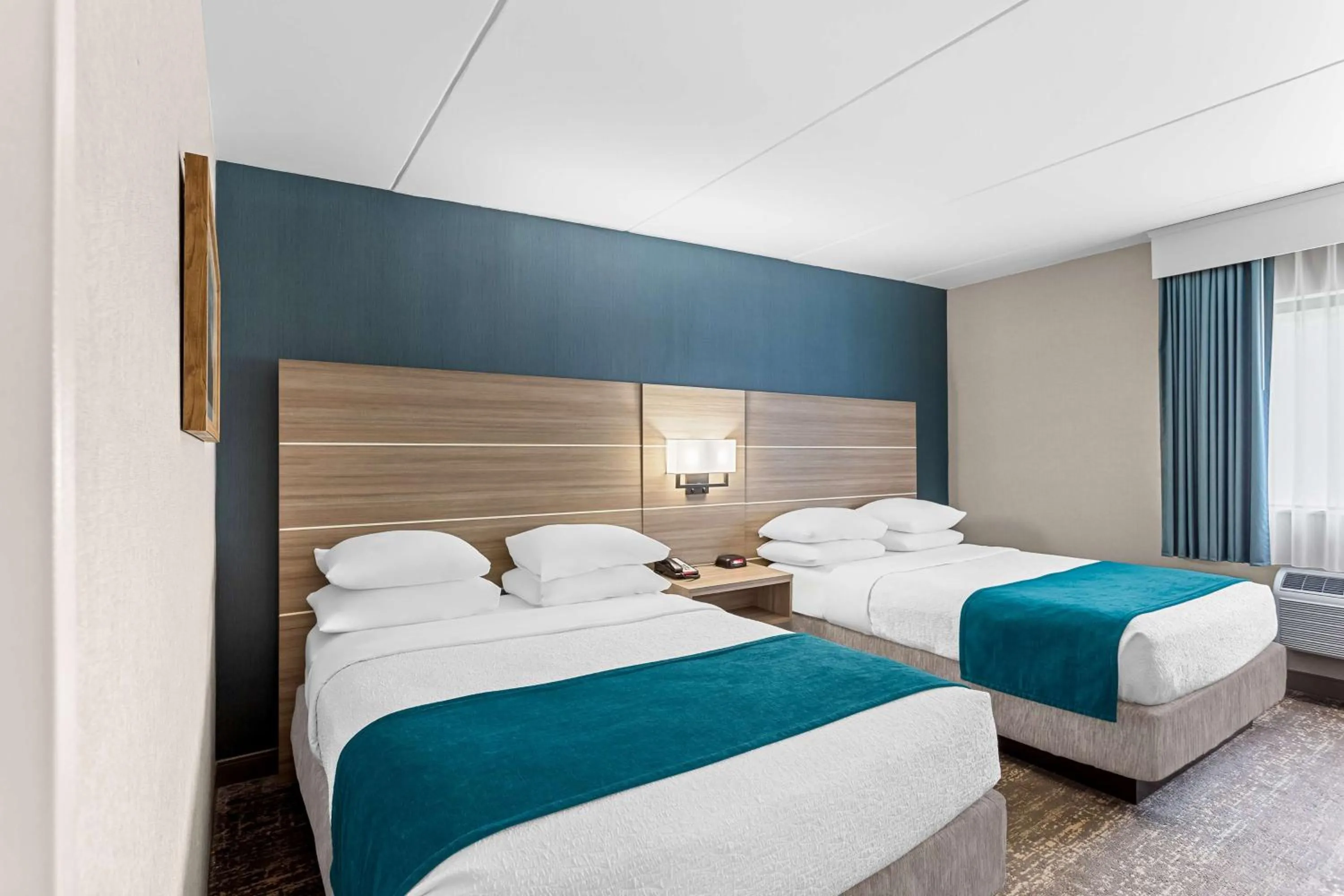 Double Room with Two Double Beds and Mobility Accessible Roll-In Shower in Best Western West Lebanon-Hanover