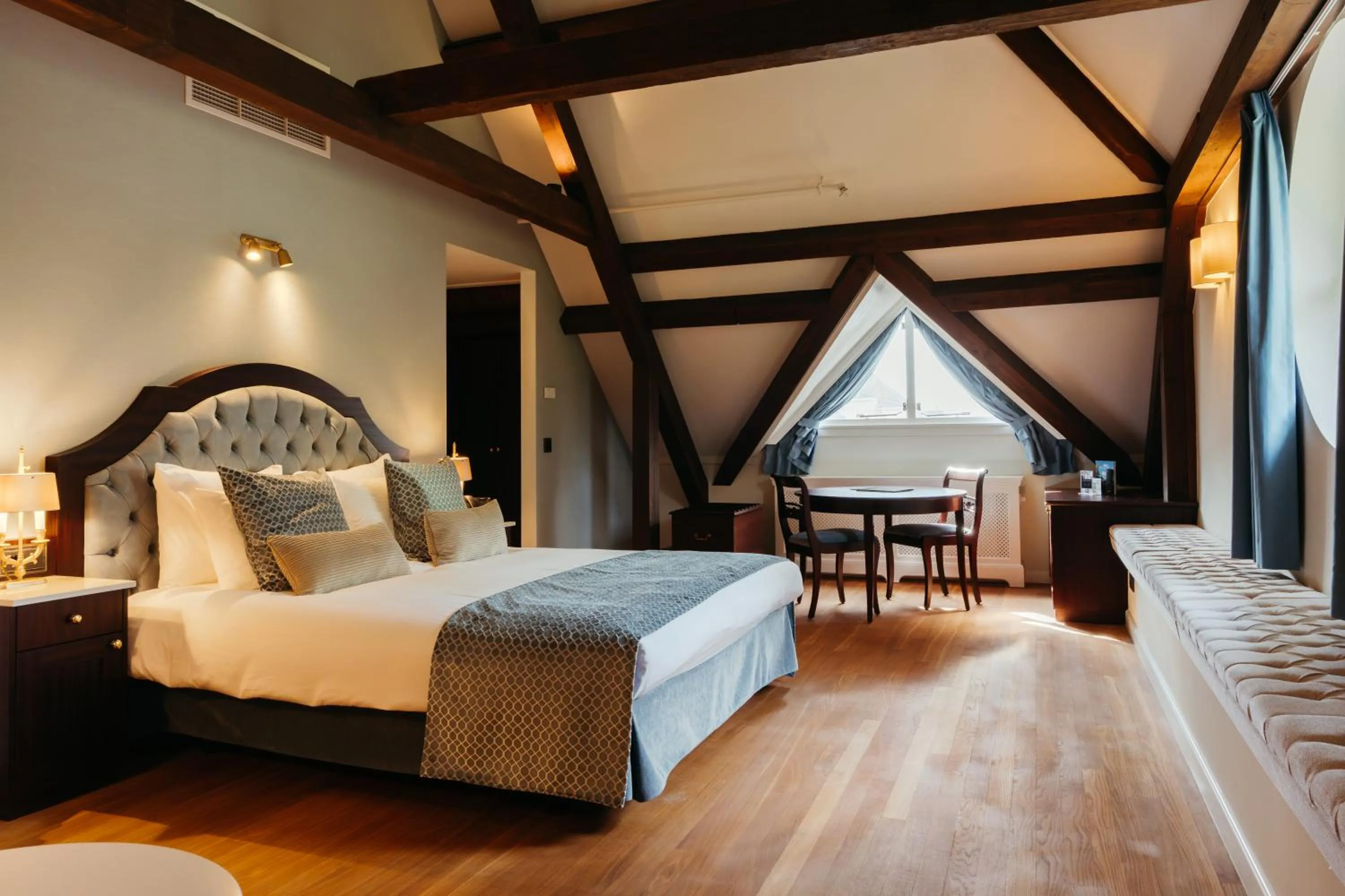 Cozy, Wooden Empire Double in Grand Hotel Karel V