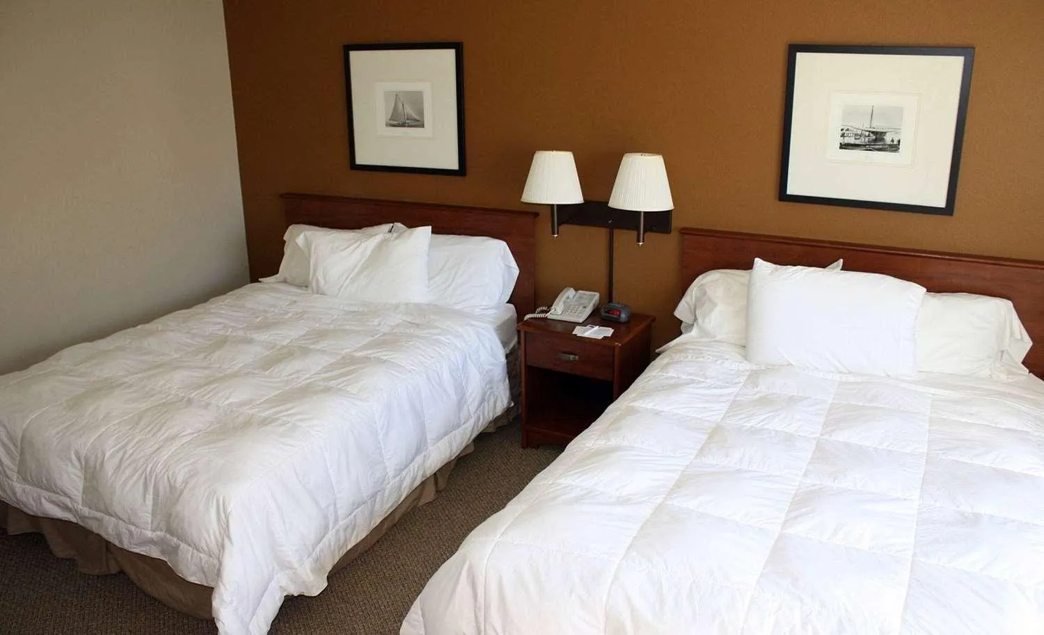 Queen Room with Two Queen Beds - Non-Smoking in AmericInn by Wyndham Charlevoix