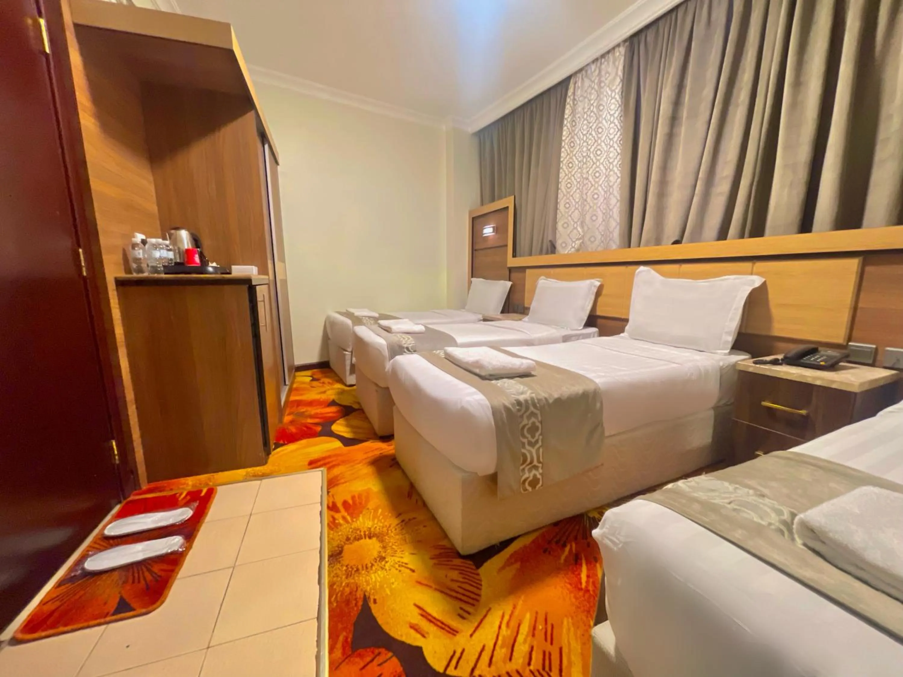 Standard Quadruple Room in Al Mukhtara Almasi Hotel