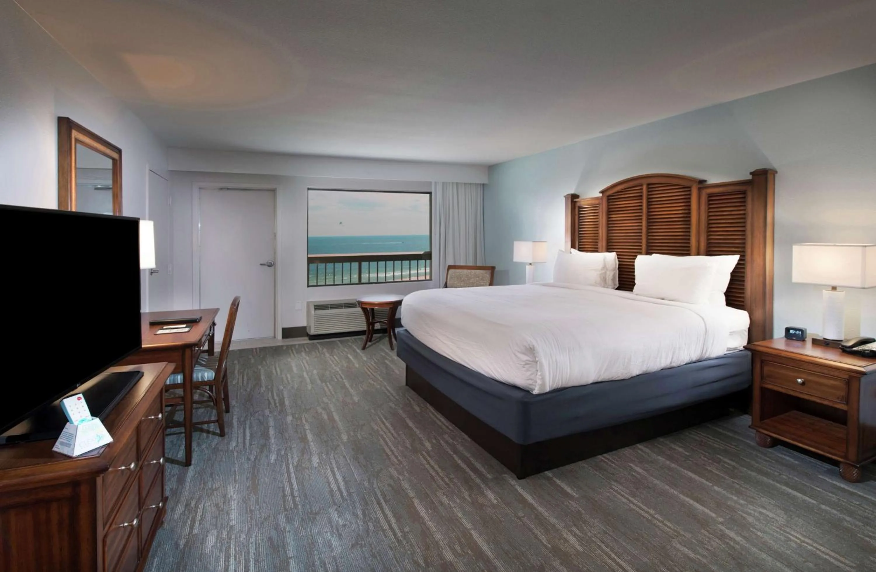 Deluxe King Room with Gulf View and Balcony in The Island House Hotel a Doubletree by Hilton