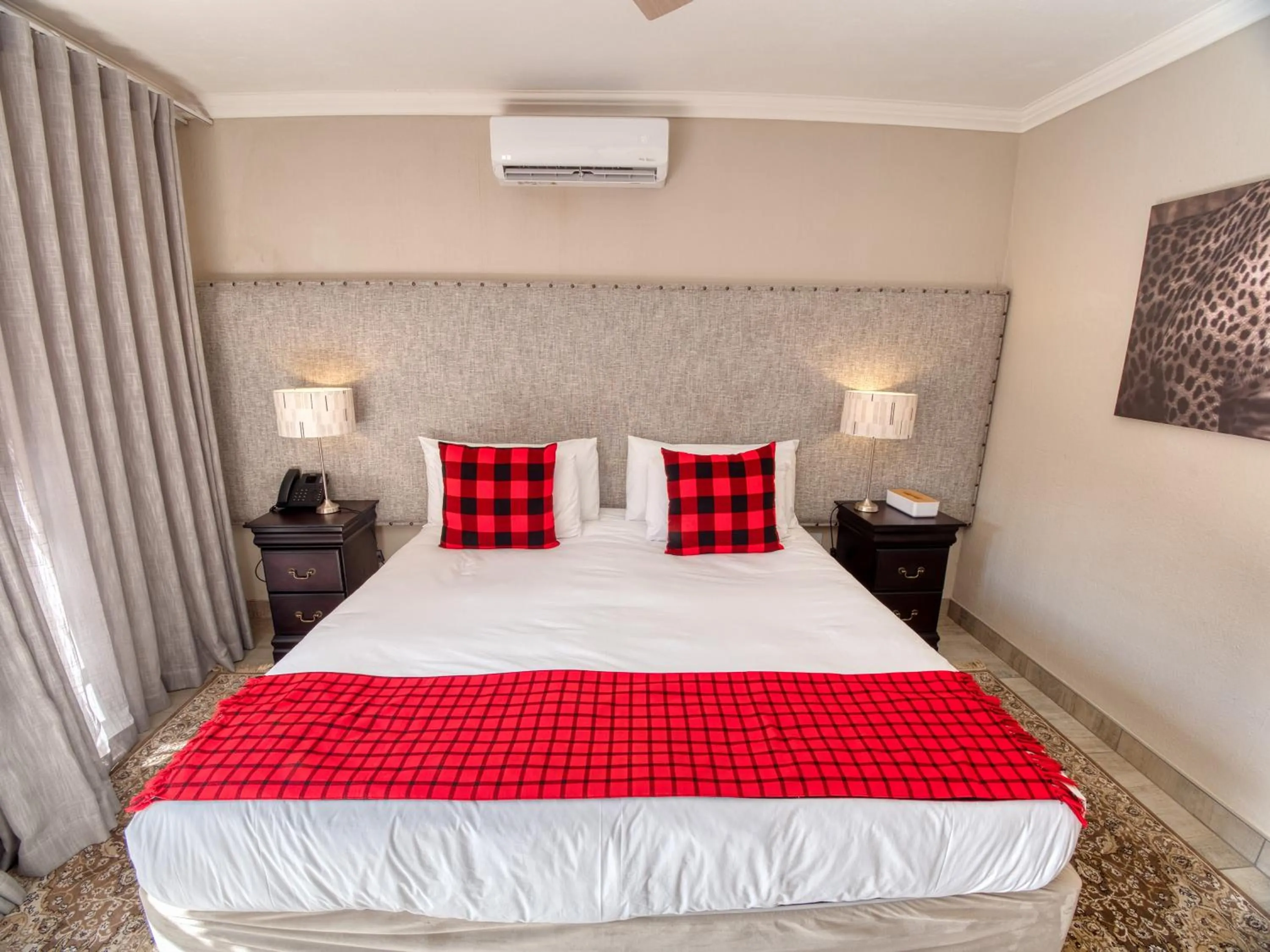 Queen Room with Balcony - single occupancy in Tembo Guest Lodge