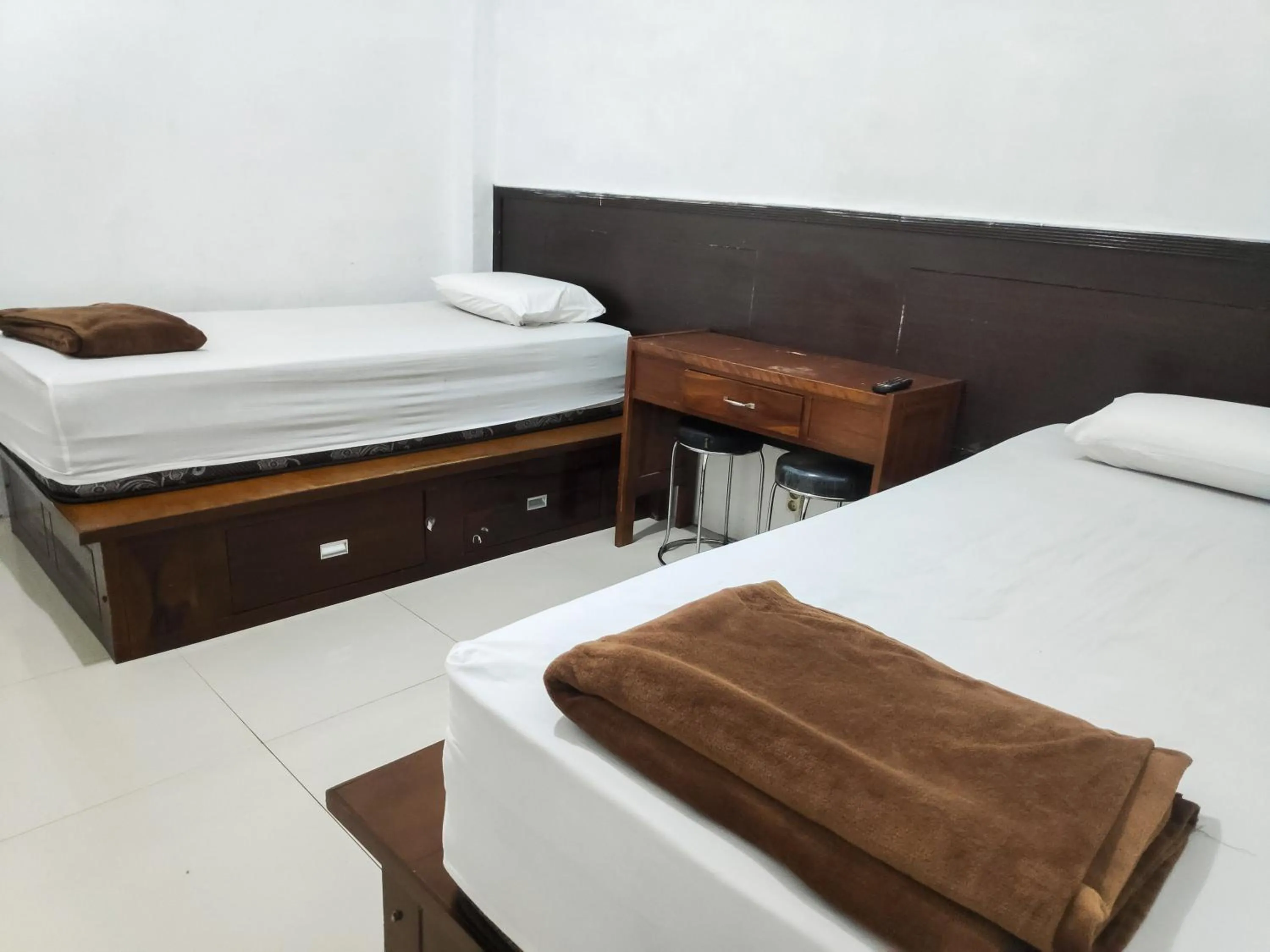 Twin Room in RedDoorz Syariah near Terminal Terpadu Langsa