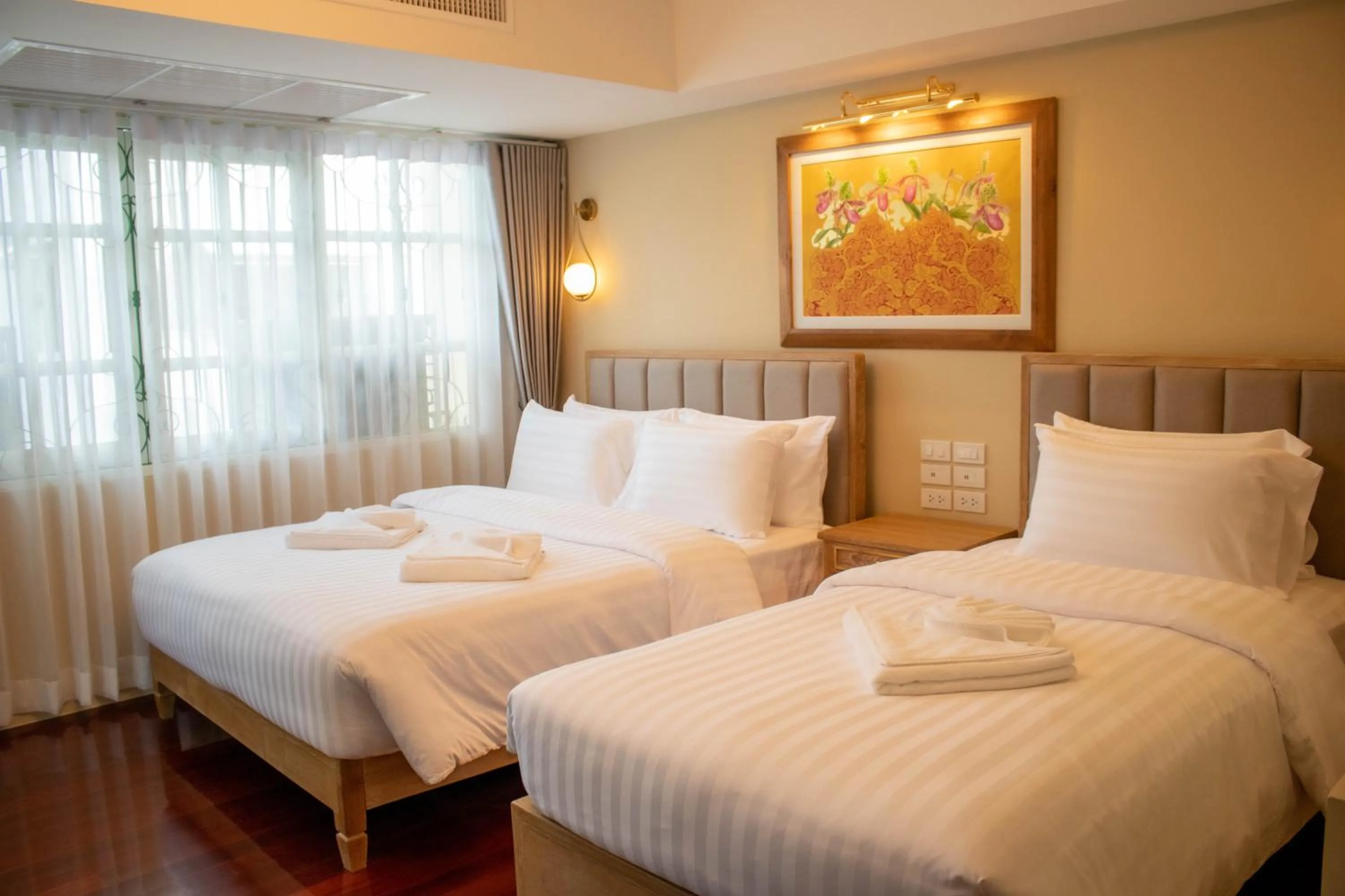 Deluxe Triple Room in Siri Grand Bangkok Hotel