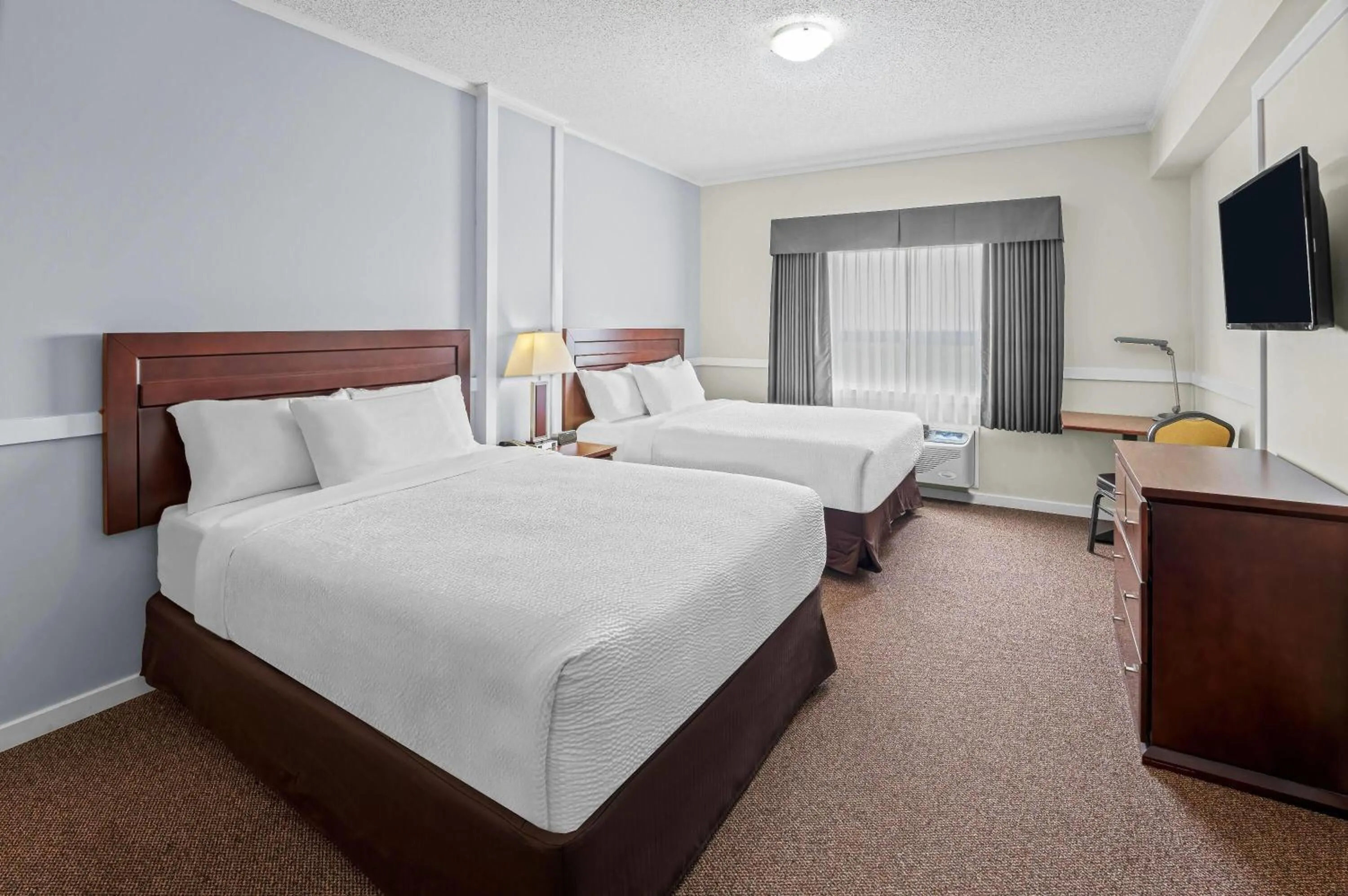 Queen Room with Two Queen Beds - Non-Smoking in Days Inn by Wyndham Lamont