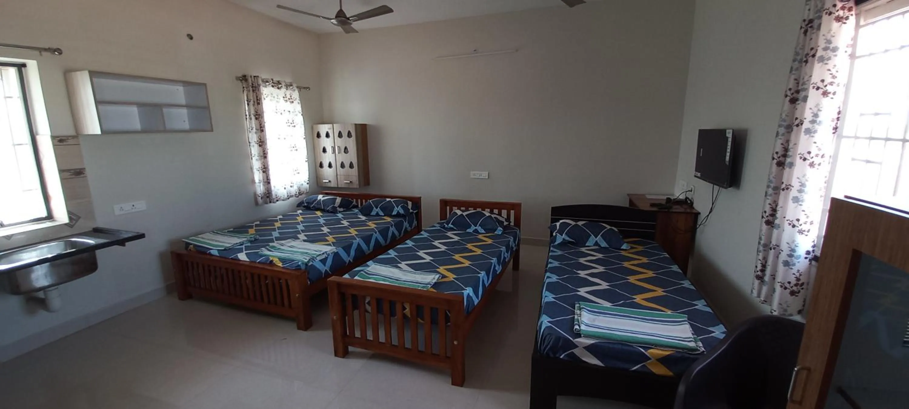 Deluxe Family Room - single occupancy in Shantham Service Apartments, Indumanagar, Coimbatore