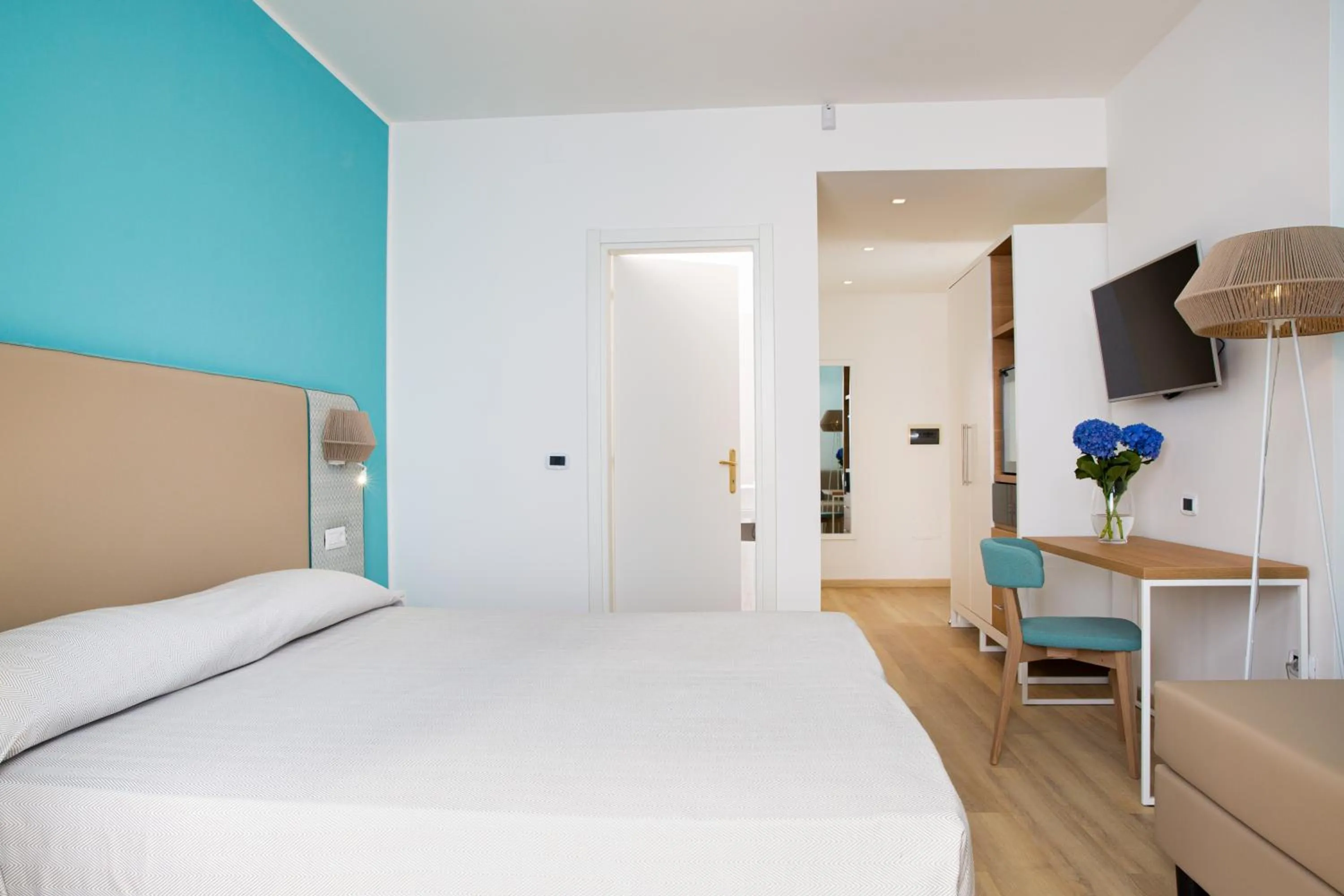 Deluxe Quadruple Room in Lu' Hotel Maladroxia