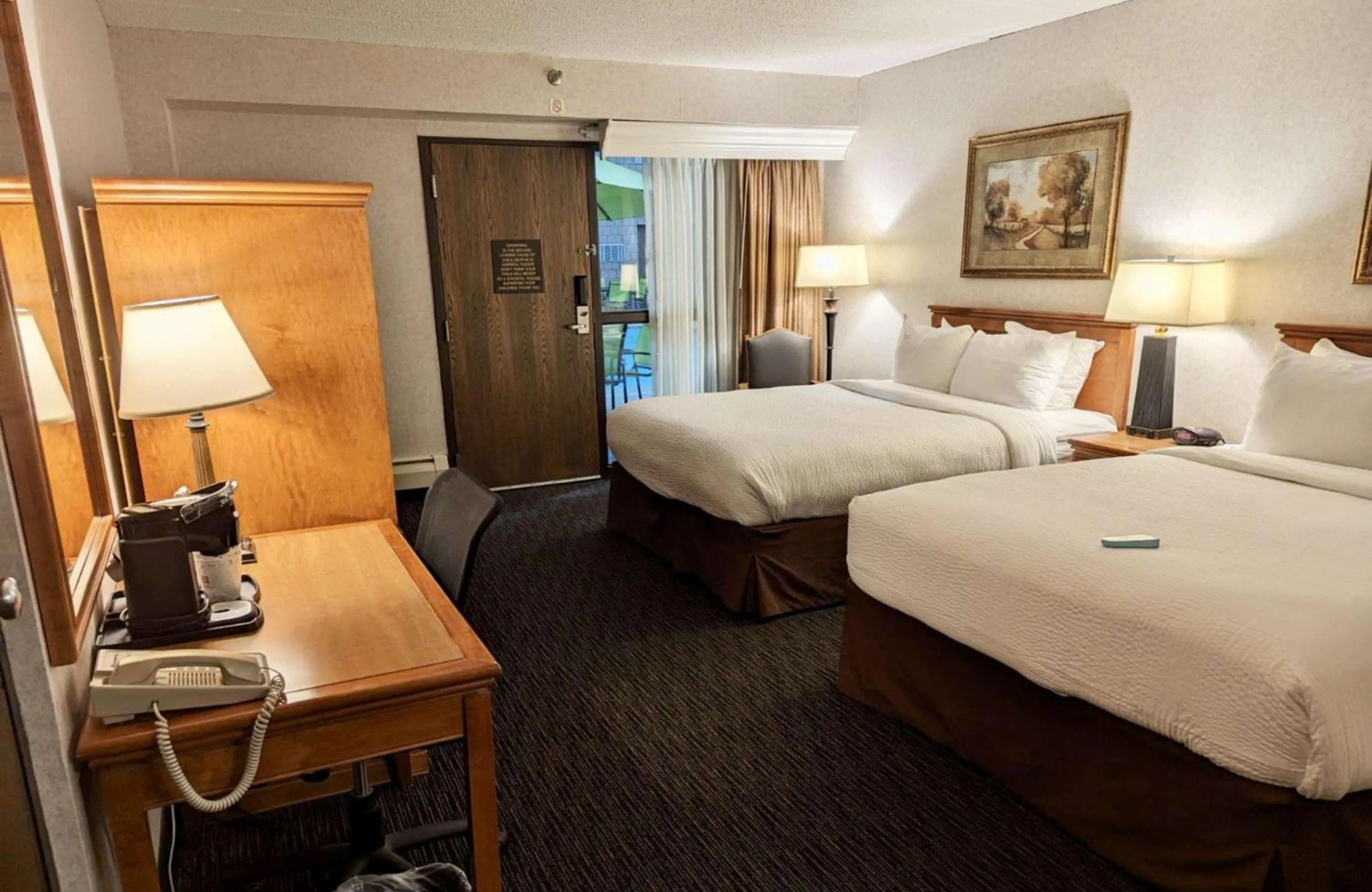 Queen Room with Two Queen Beds and Pool View in Best Western Plus Kelly Inn