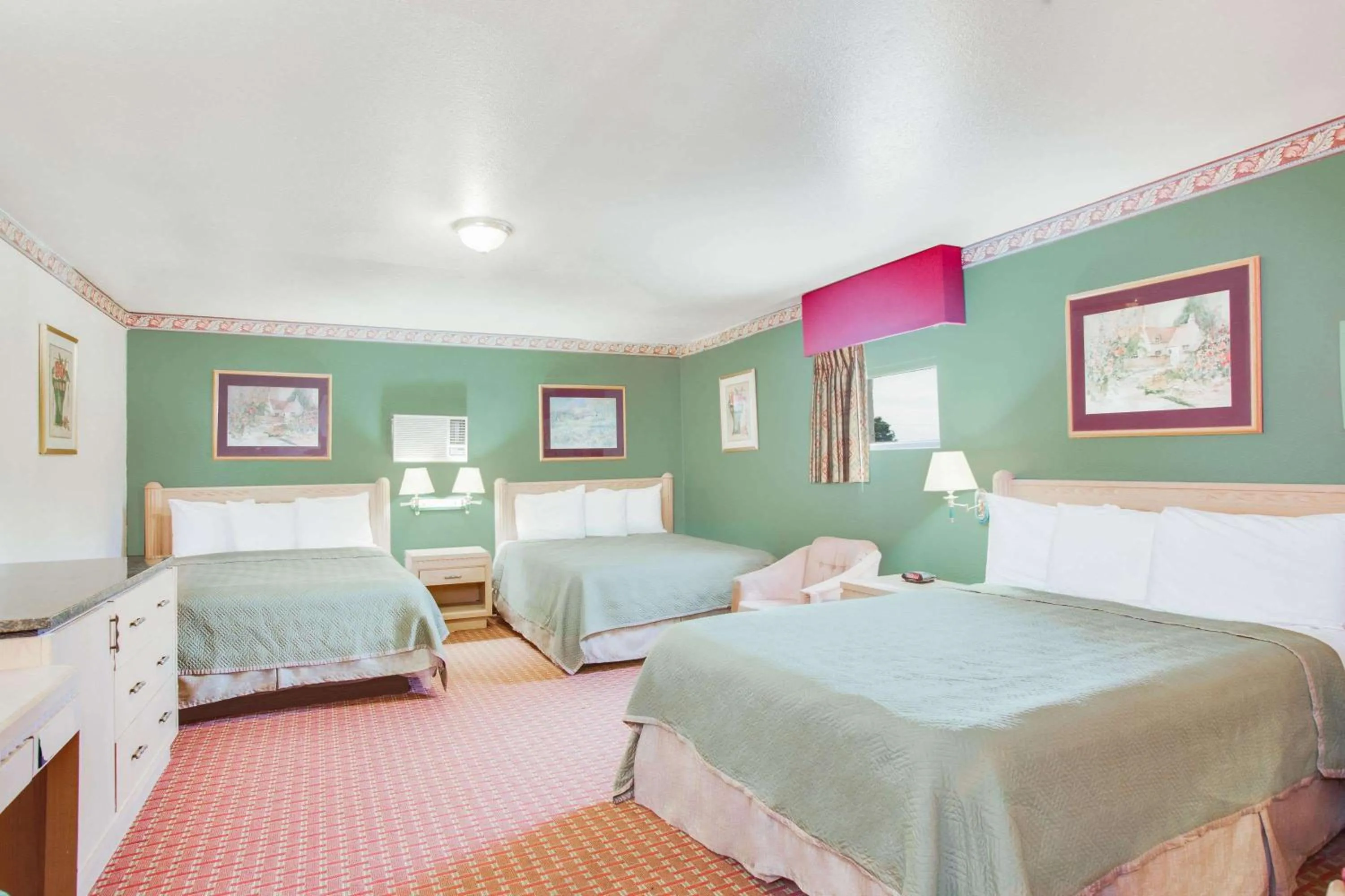 Deluxe Room with Three Queen Beds - Non-Smoking in Travelodge by Wyndham Memphis