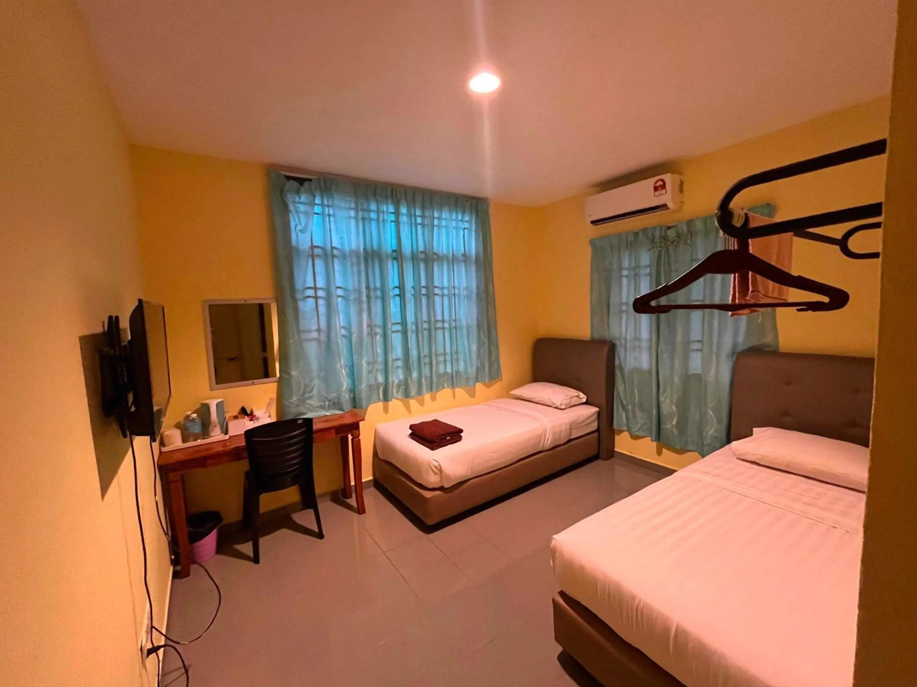 Deluxe Twin Room in Hotel O RAHMAH SOJOURN CENTRE