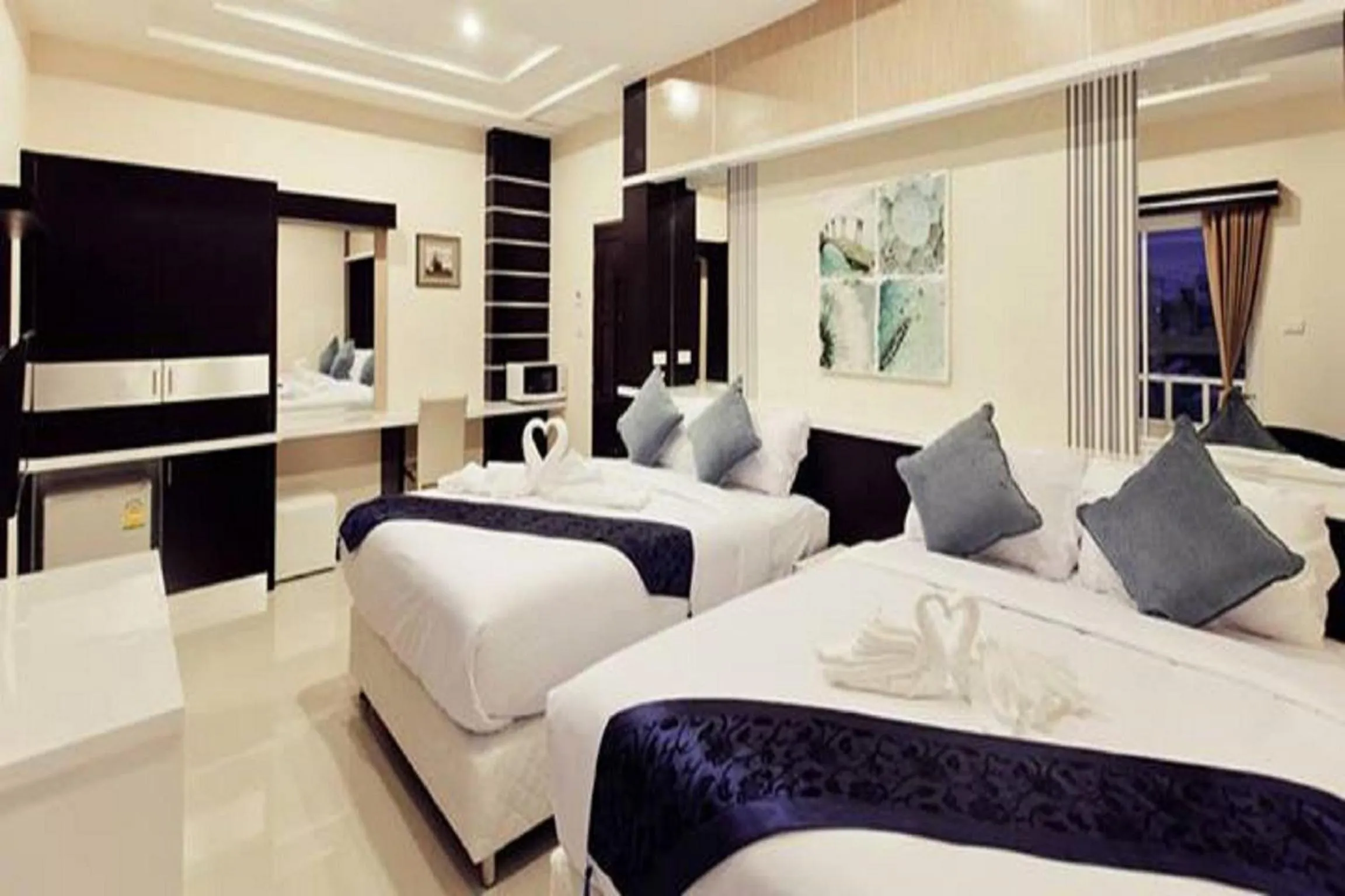 Family Double Room in Excella Hotel