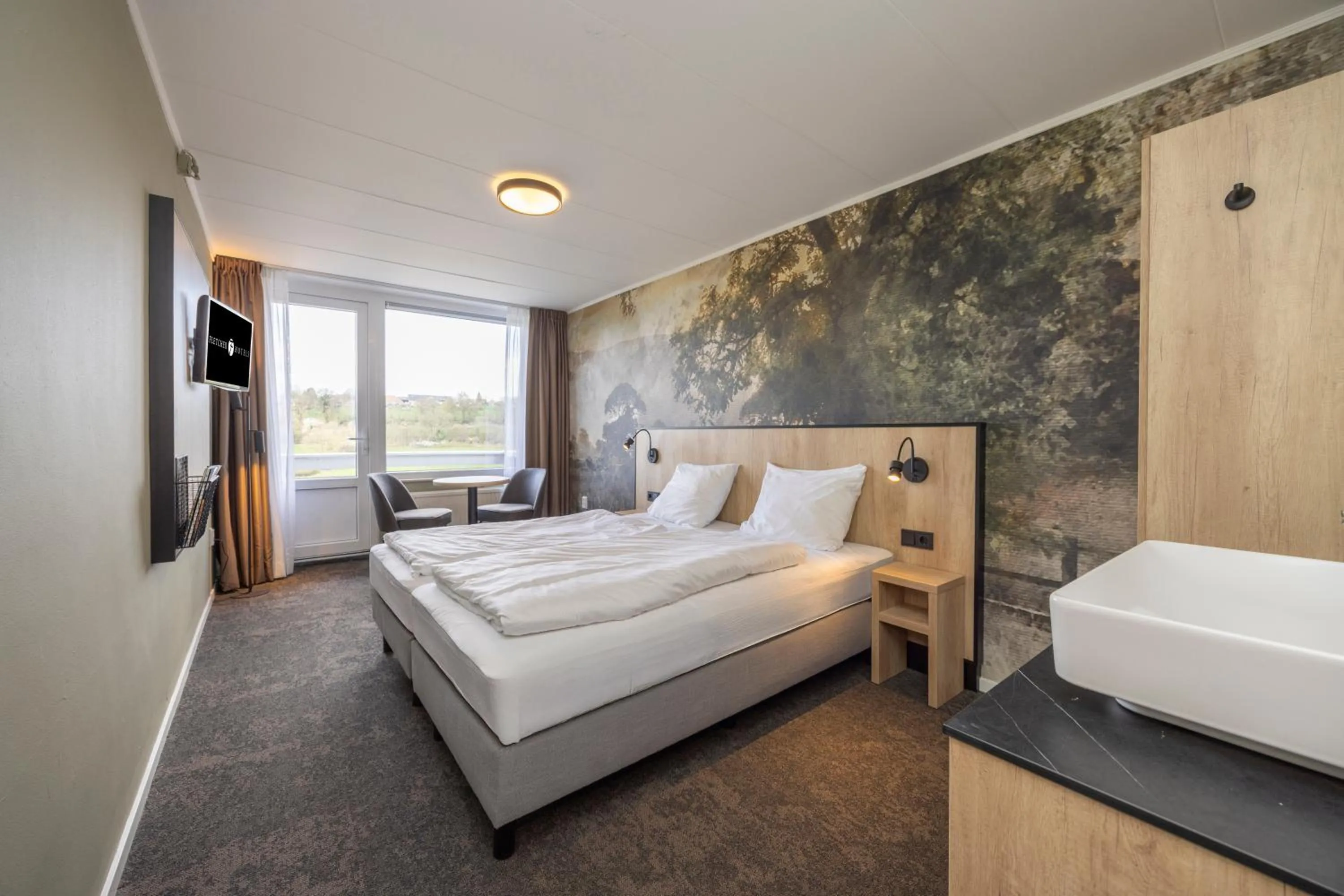 Small Room with Balcony in Fletcher Hotel Restaurant Bon Repos