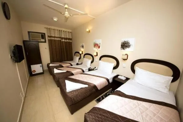 Quadruple Room in Grand Sina Hotel