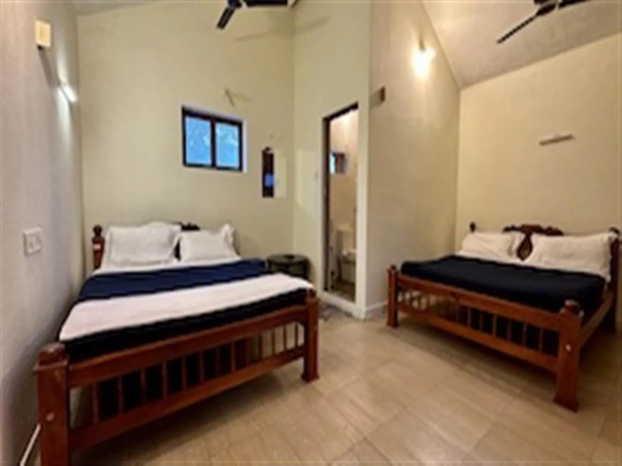 Deluxe Quadruple Room in The Wild Farms By Gwestai