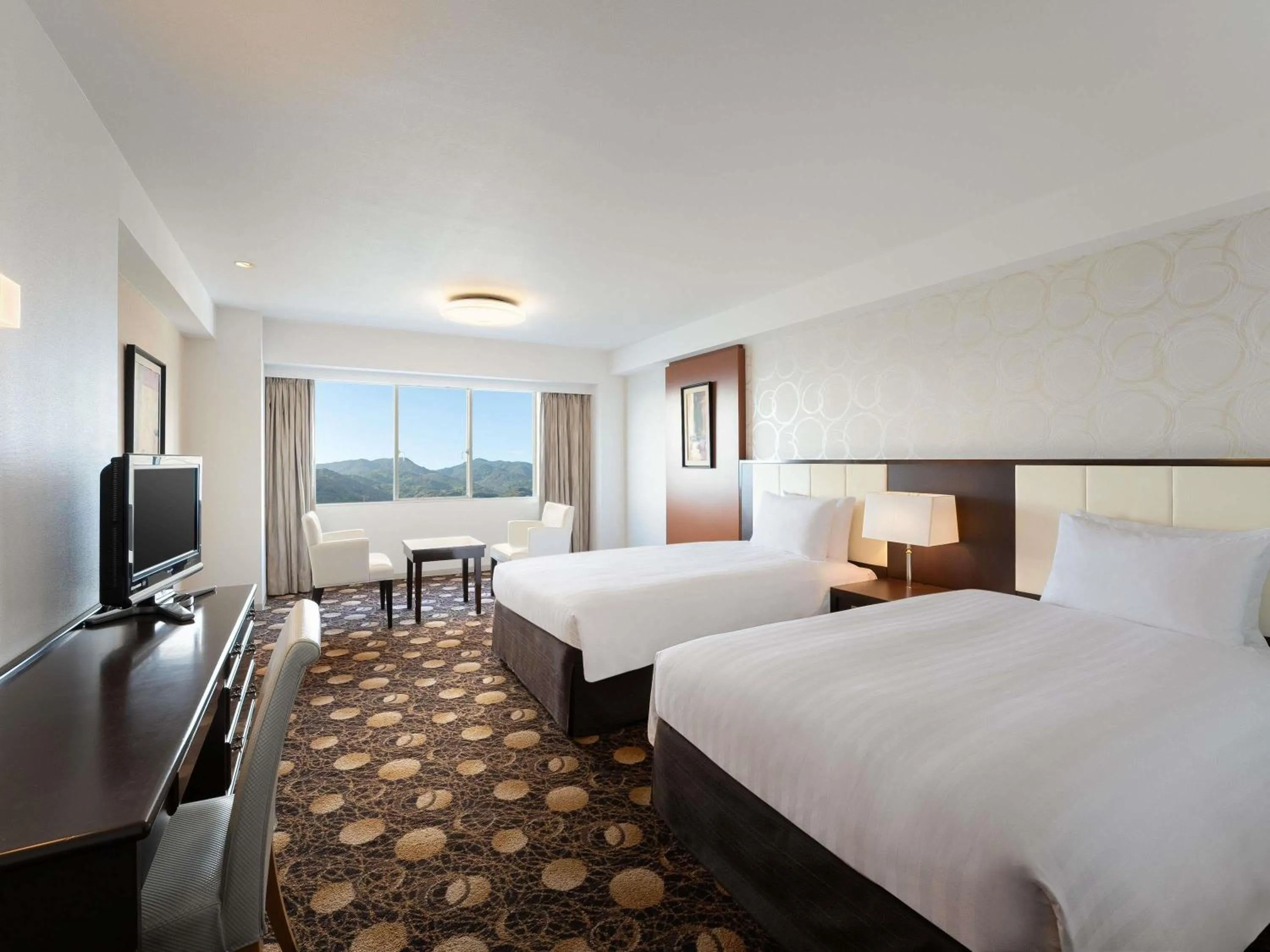 Standard Twin Room with Extra Bed and Mountain View in Grand Mercure Beppu Bay Resort & Spa