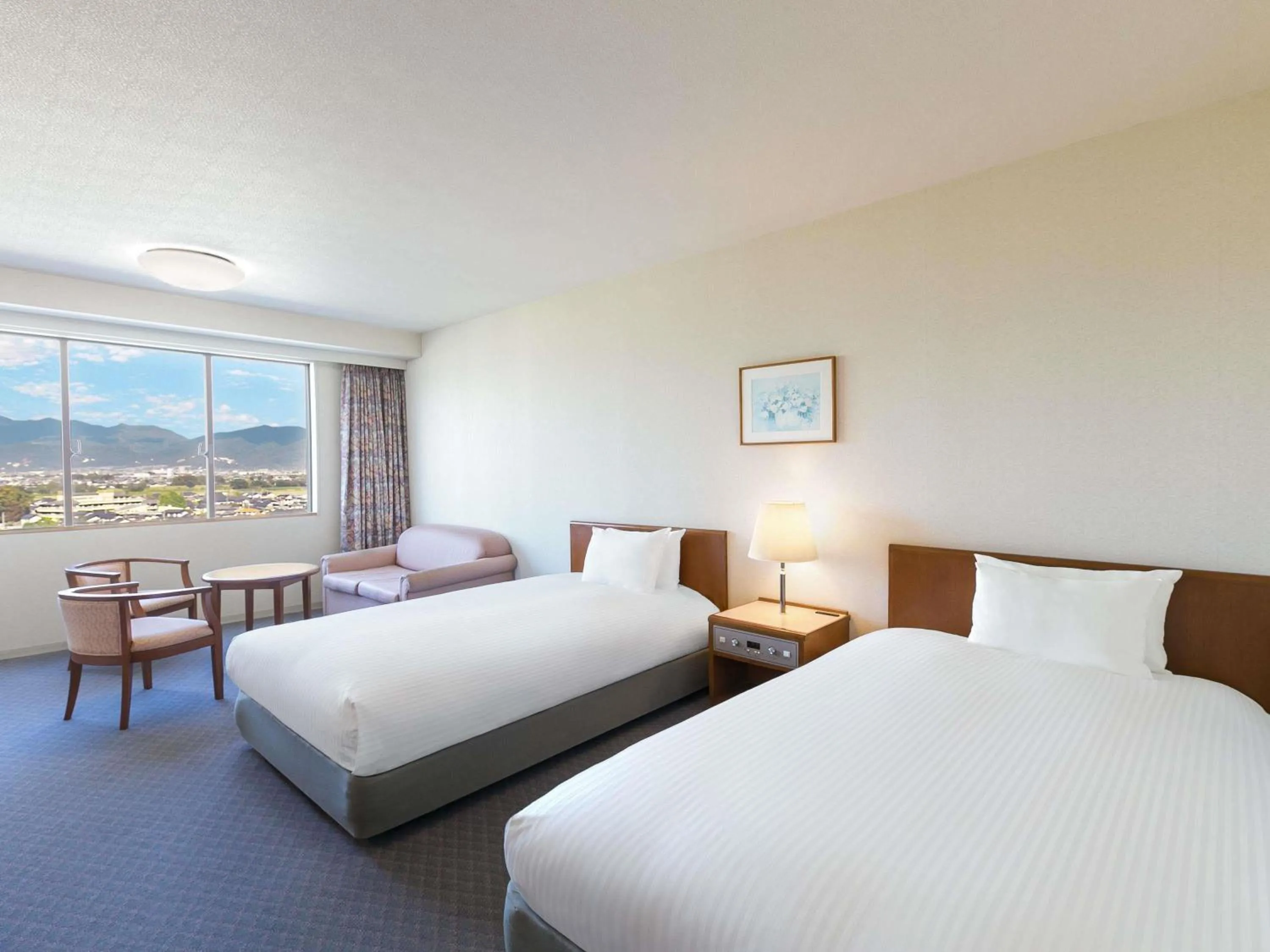 Classic Twin Room with Sofa Bed and Mountain View in Mercure Nagano Matsushiro Resort & Spa
