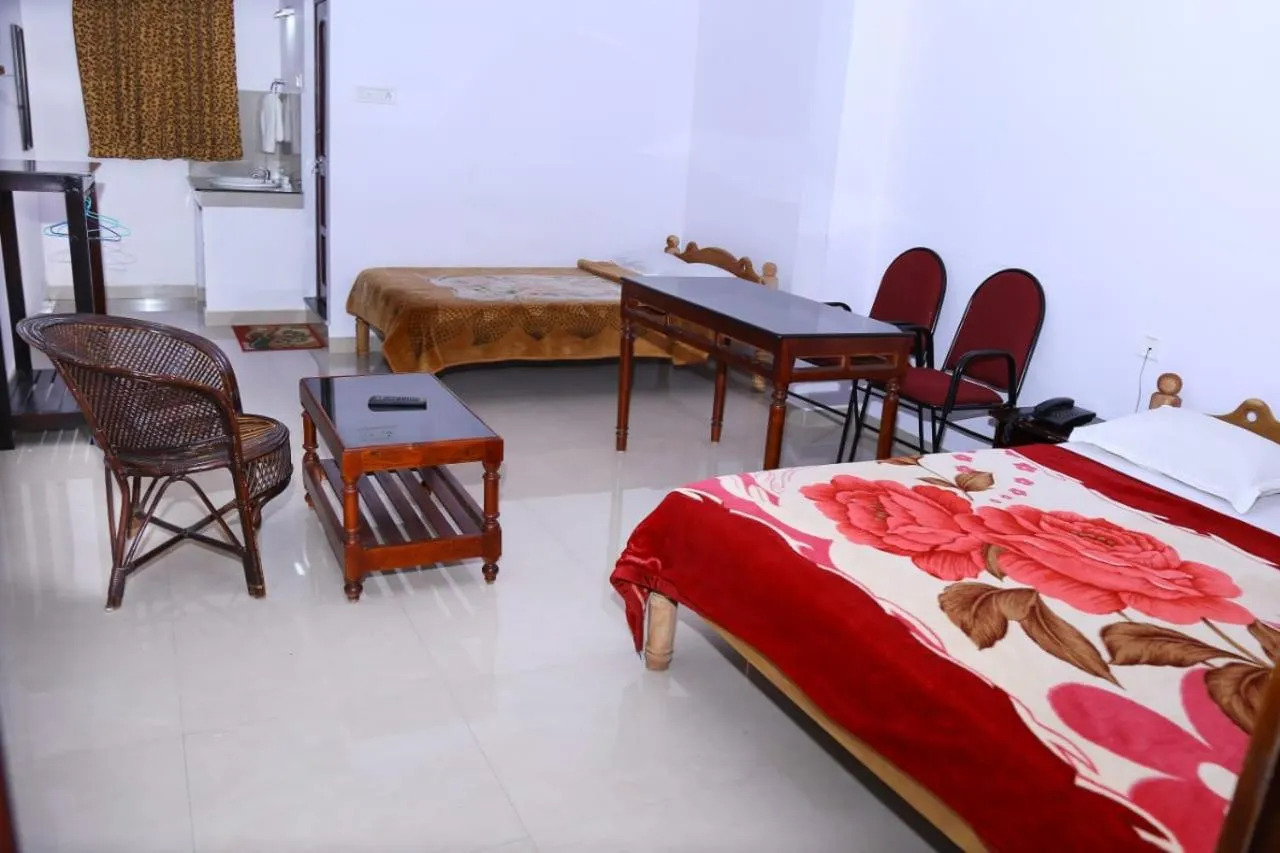 Quadruple Room in Dubai Hotel & Restaurant Kumarakom