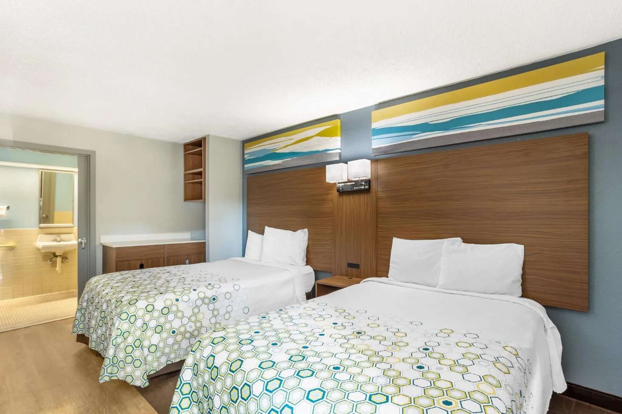 Studio with Two Double Beds Disability Access Roll-In Shower Non-Smoking in HomeTowne Studios by Red Roof Lancaster