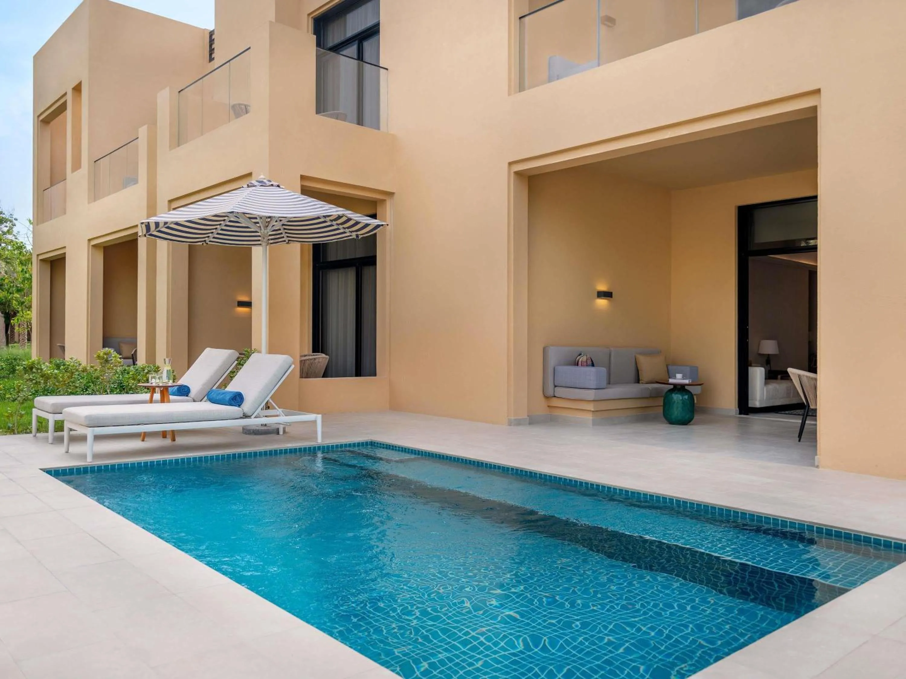 One-Bedroom Signature Suite with Private Pool, Garden View, and Club Access in Sofitel Al Hamra Beach Resort