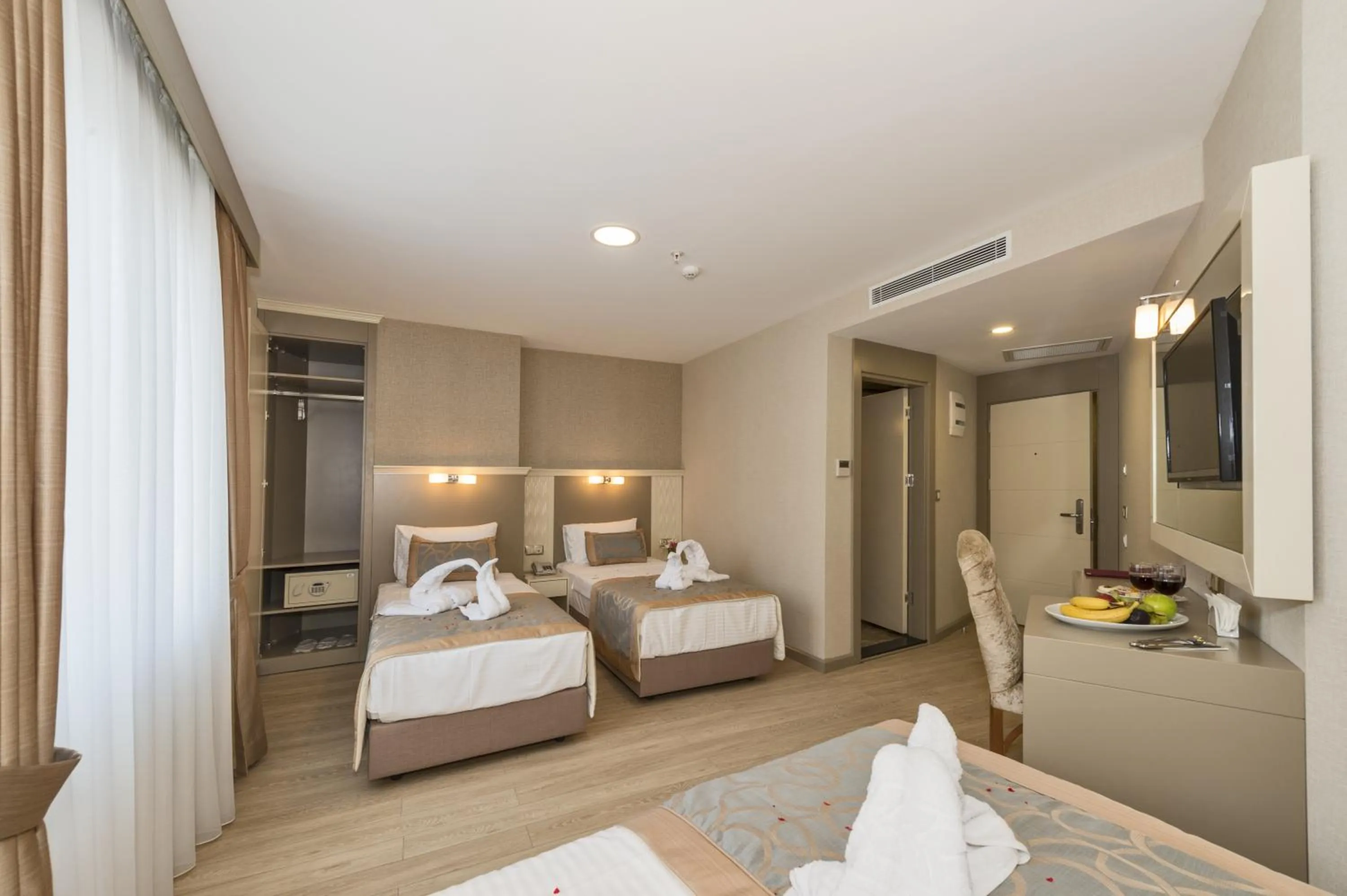 Standard Triple Room in Marcello Hotel