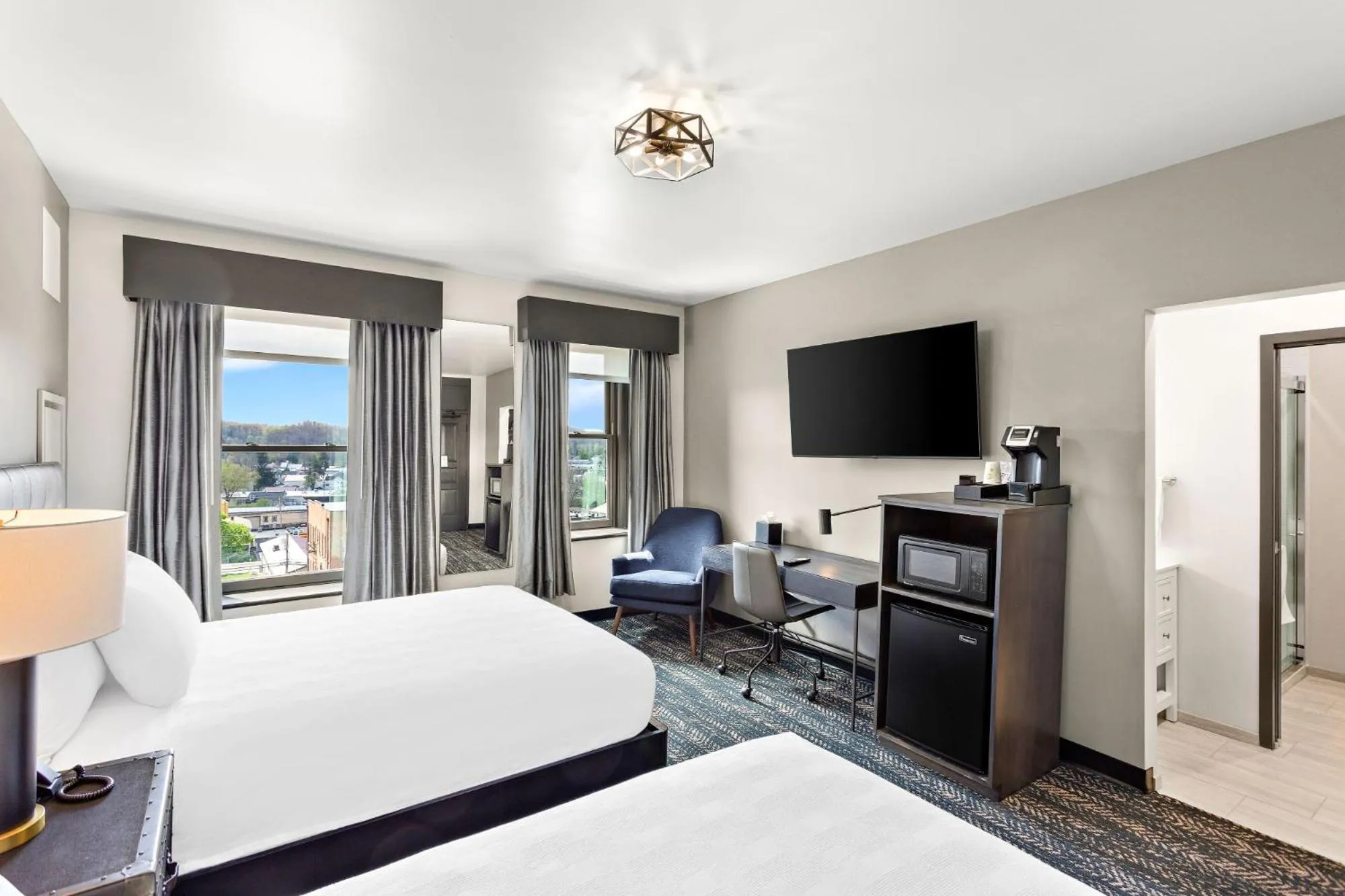 Quadruple Room with Two Queen Beds - Non Smoking/Interior Hall in Tygart Hotel, an Ascend Collection Hotel