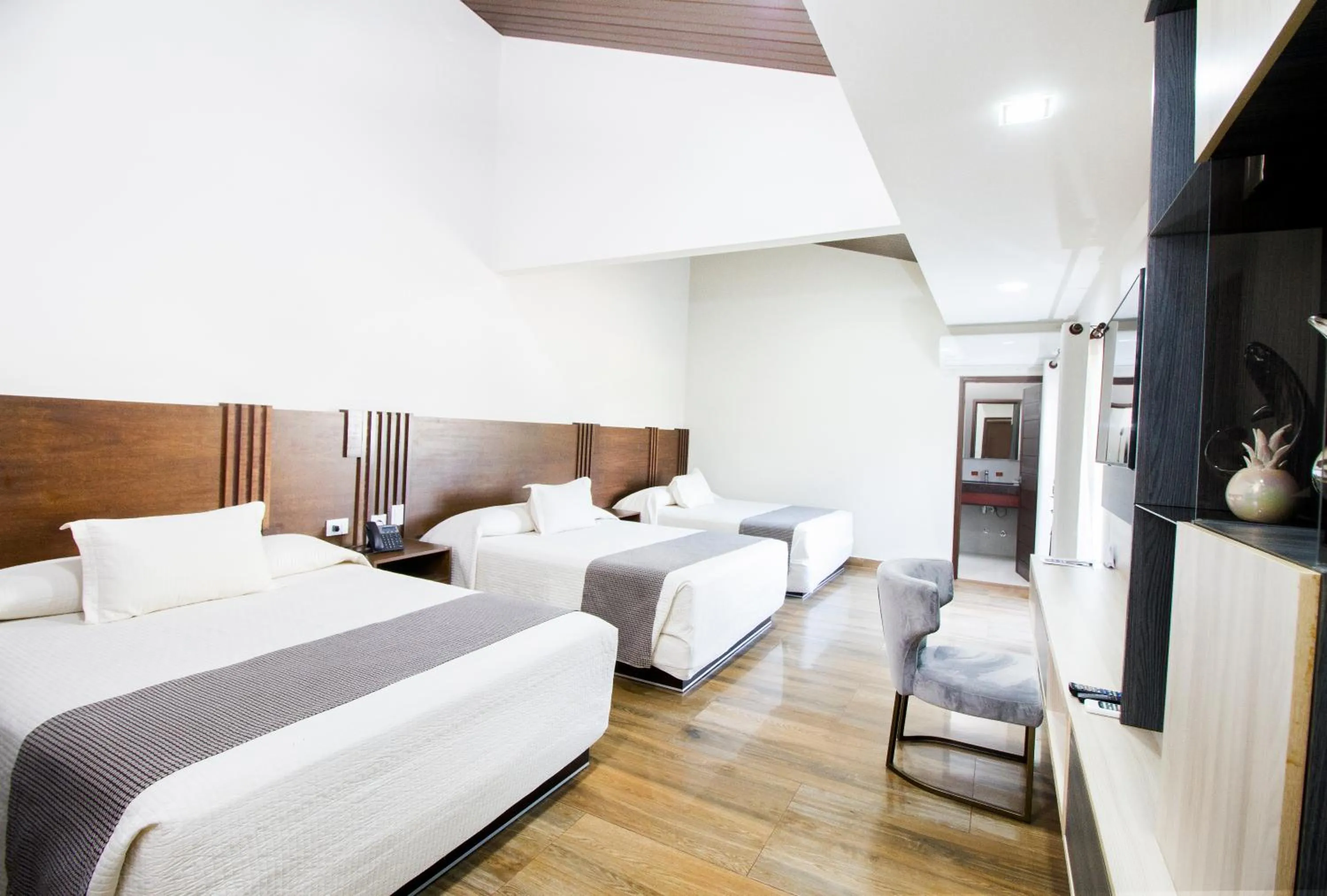 Comfort Triple Room in Hotel Sirari By Regina
