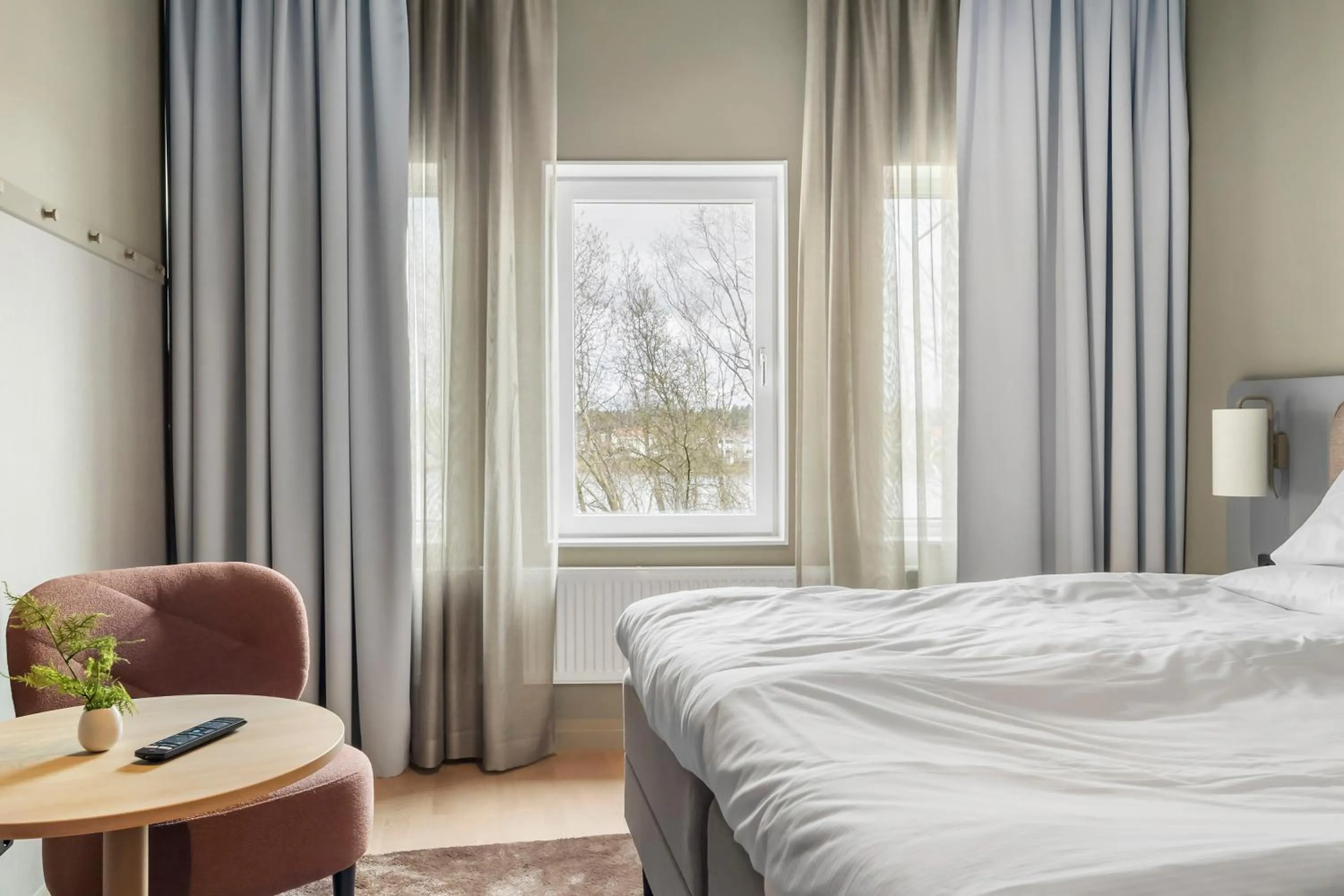Family Room with Two Single Beds and One Bunk Bed  - View over Klarälven in Aiden by Best Western Karlstad Arena