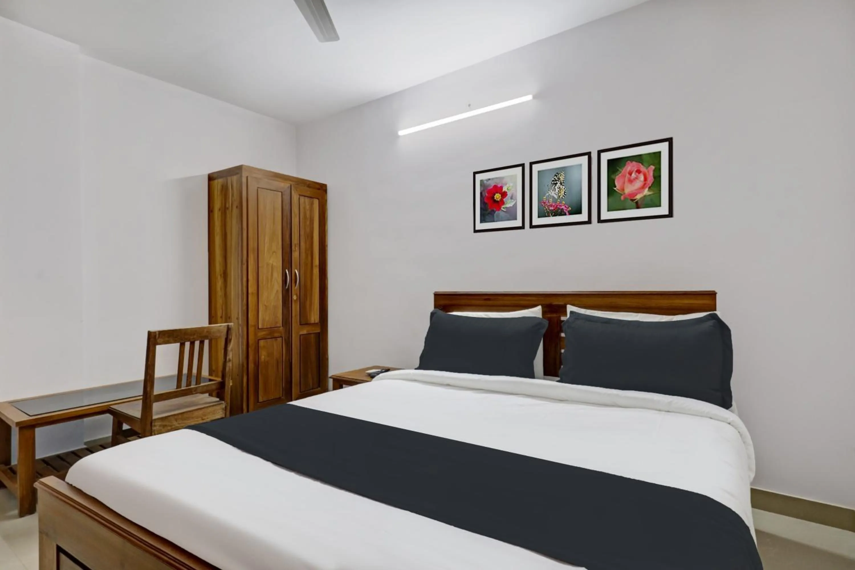 Classic Triple Room - single occupancy in Super Hotel O Anayara Near Lulu Mall formerly Timber Residency