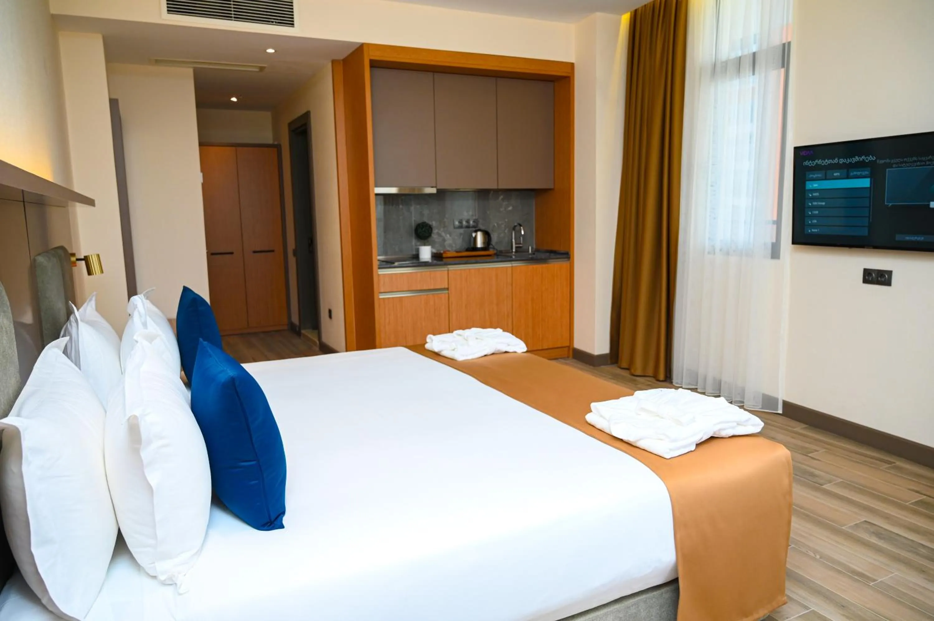 Family Room with Balcony in New Wave Apart-Hotel