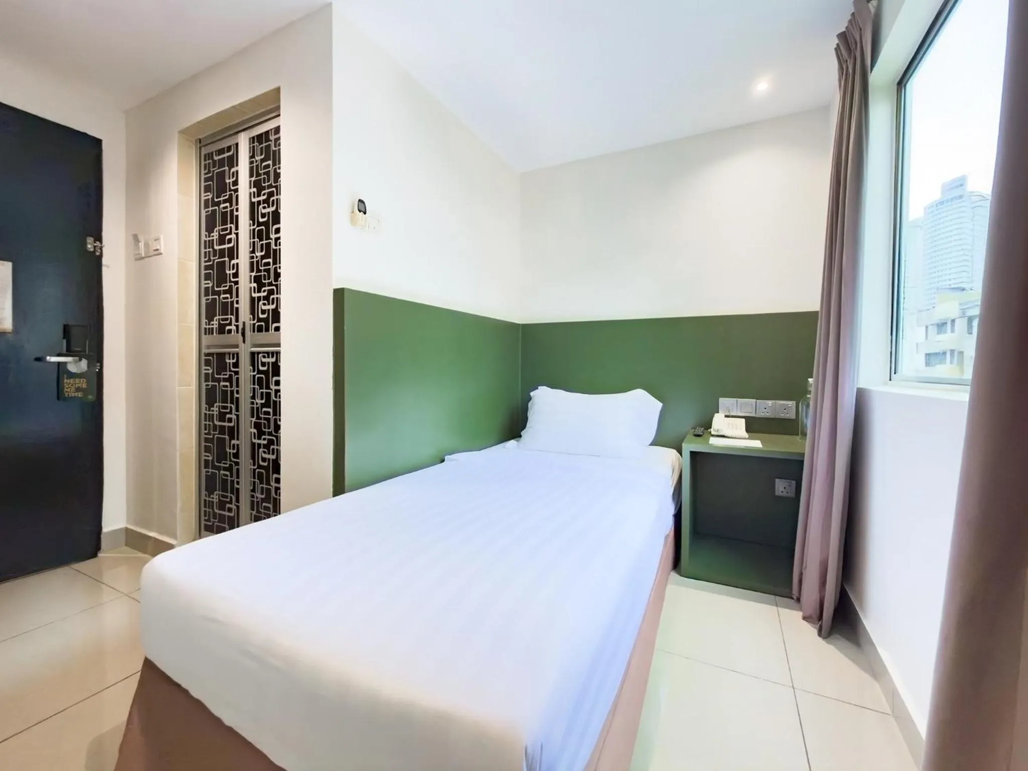 Single Room with Private Bathroom - single occupancy in Living At DSulaiman Hotel