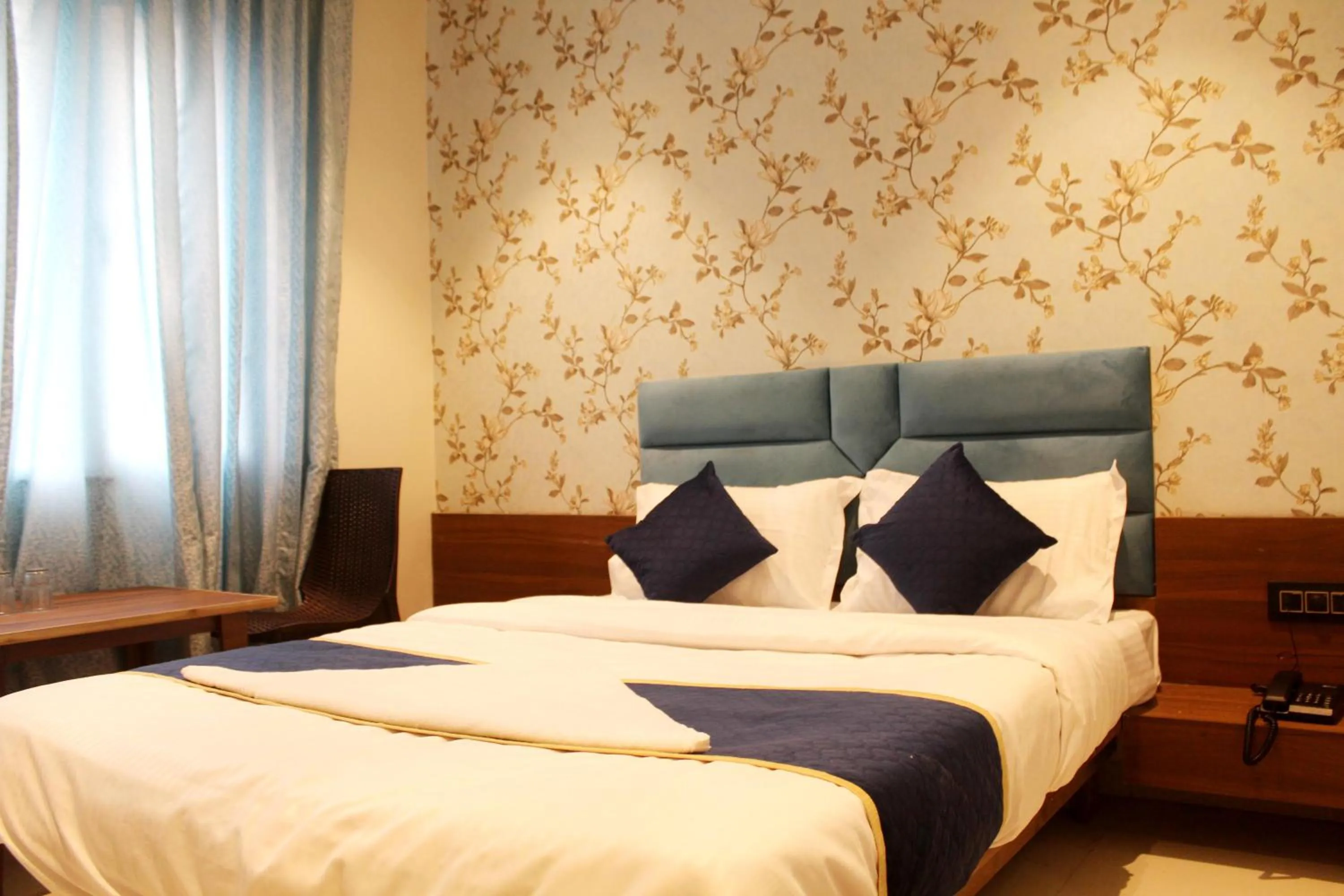 Deluxe Room - single occupancy in Hotel India Gate Narhe, Pune