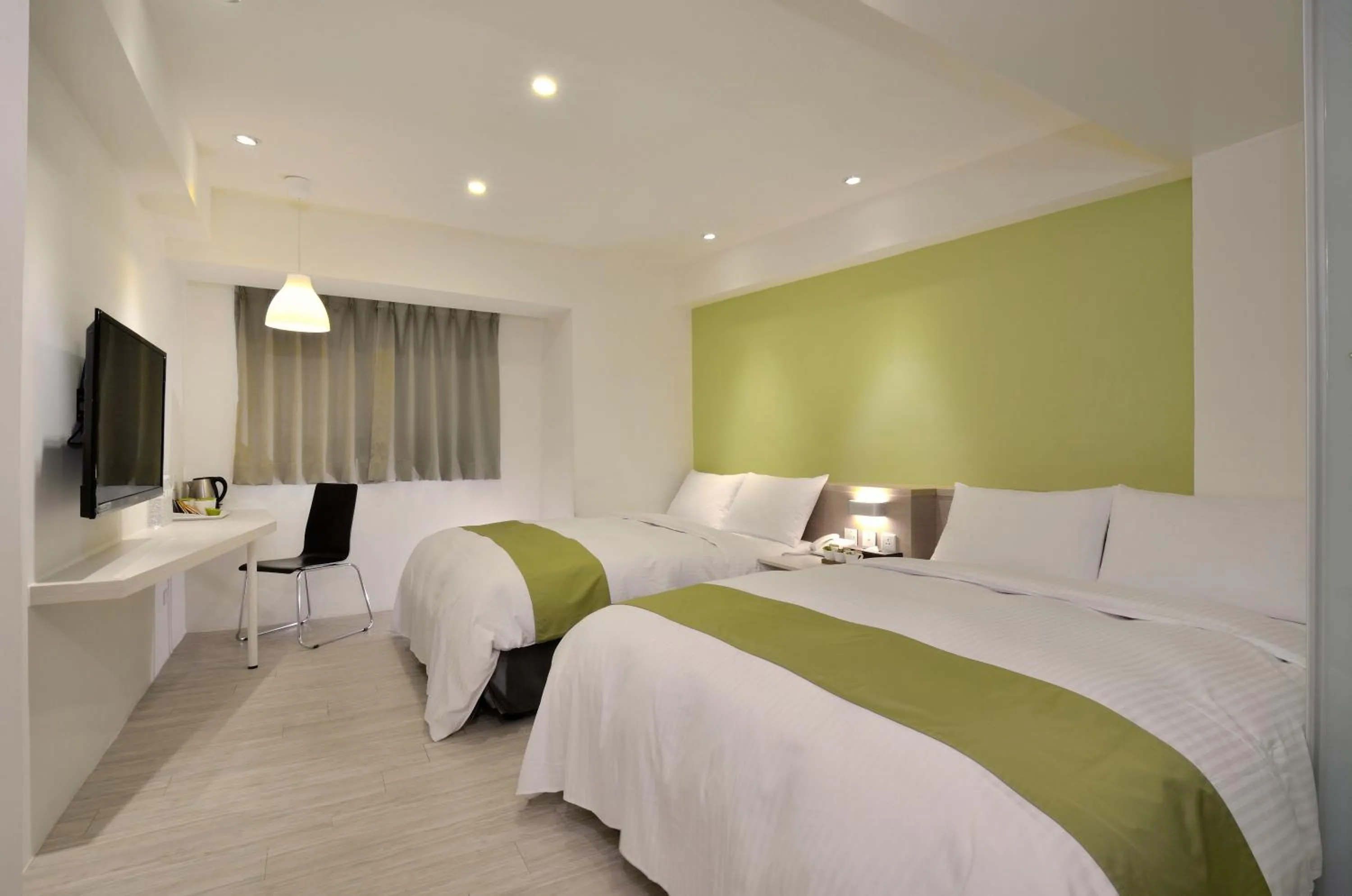 Standard Quadruple Room in Green Hotel - Fengjia