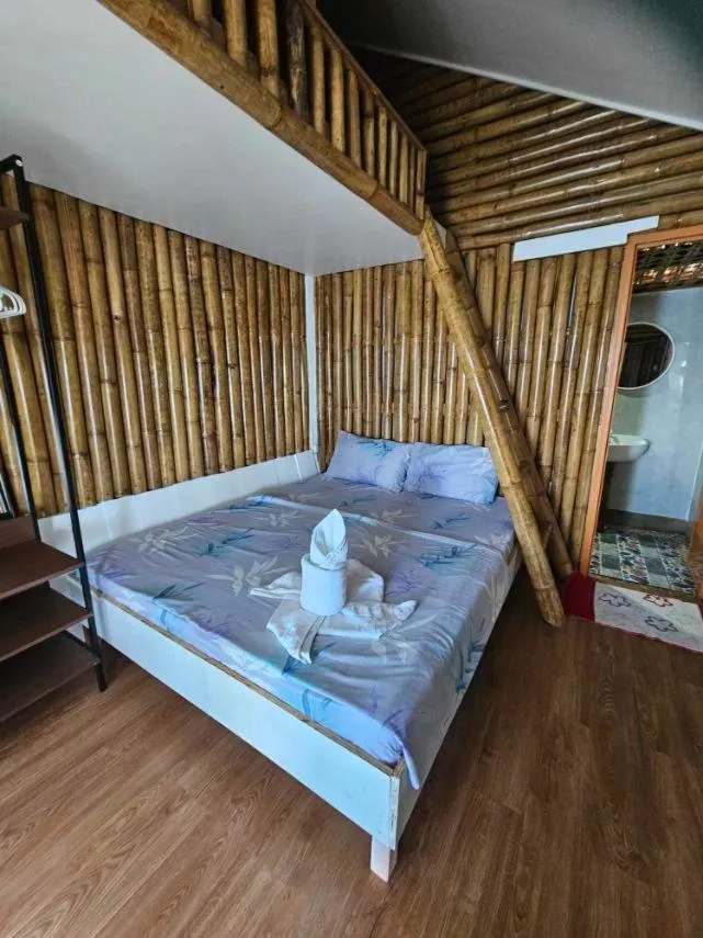 Triple Room with Sea View in Tambayan Rooms and Cottages by SMS Hospitality