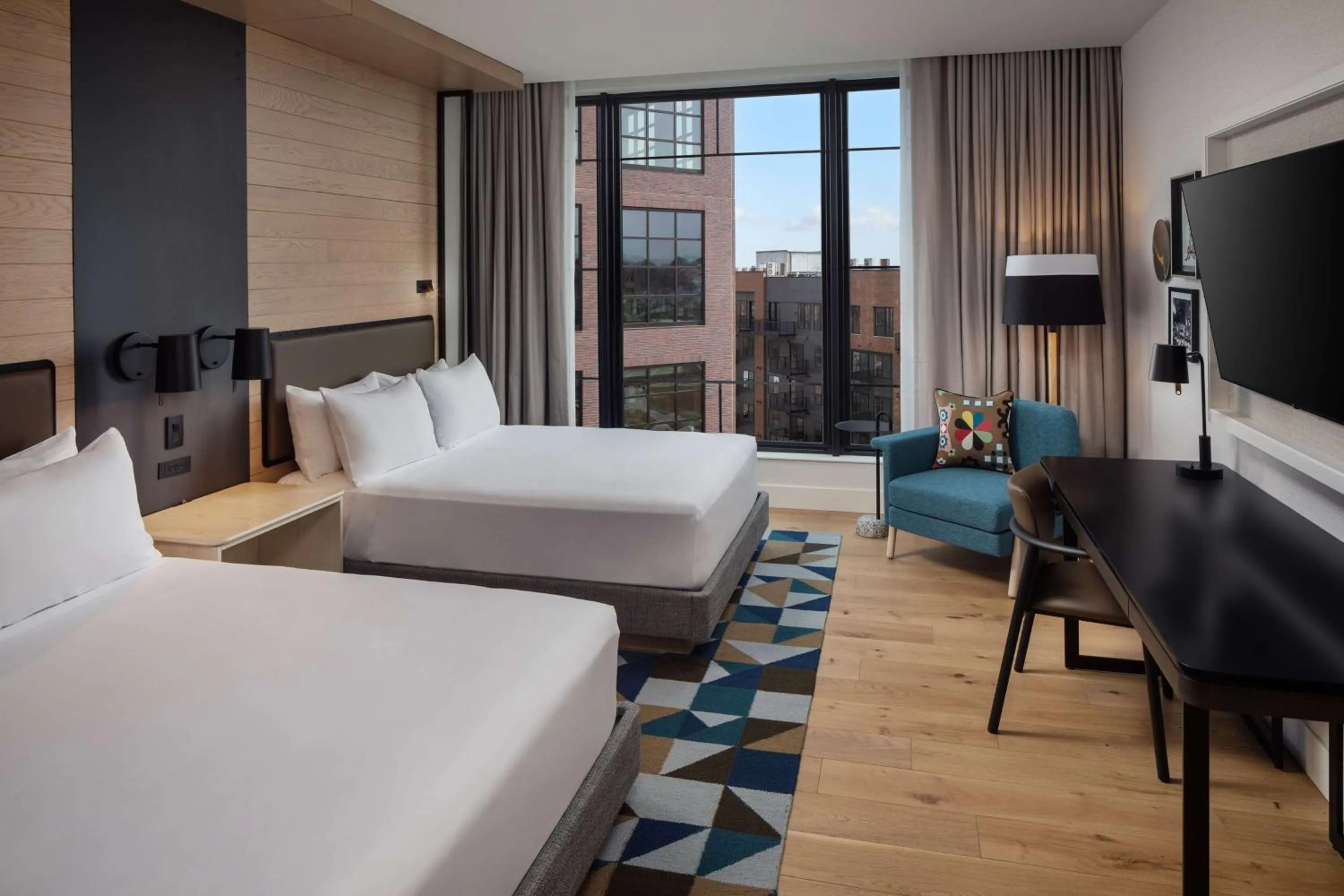 Queen Room with Two Queen Beds and Steel District View in Canopy By Hilton Sioux Falls Downtown