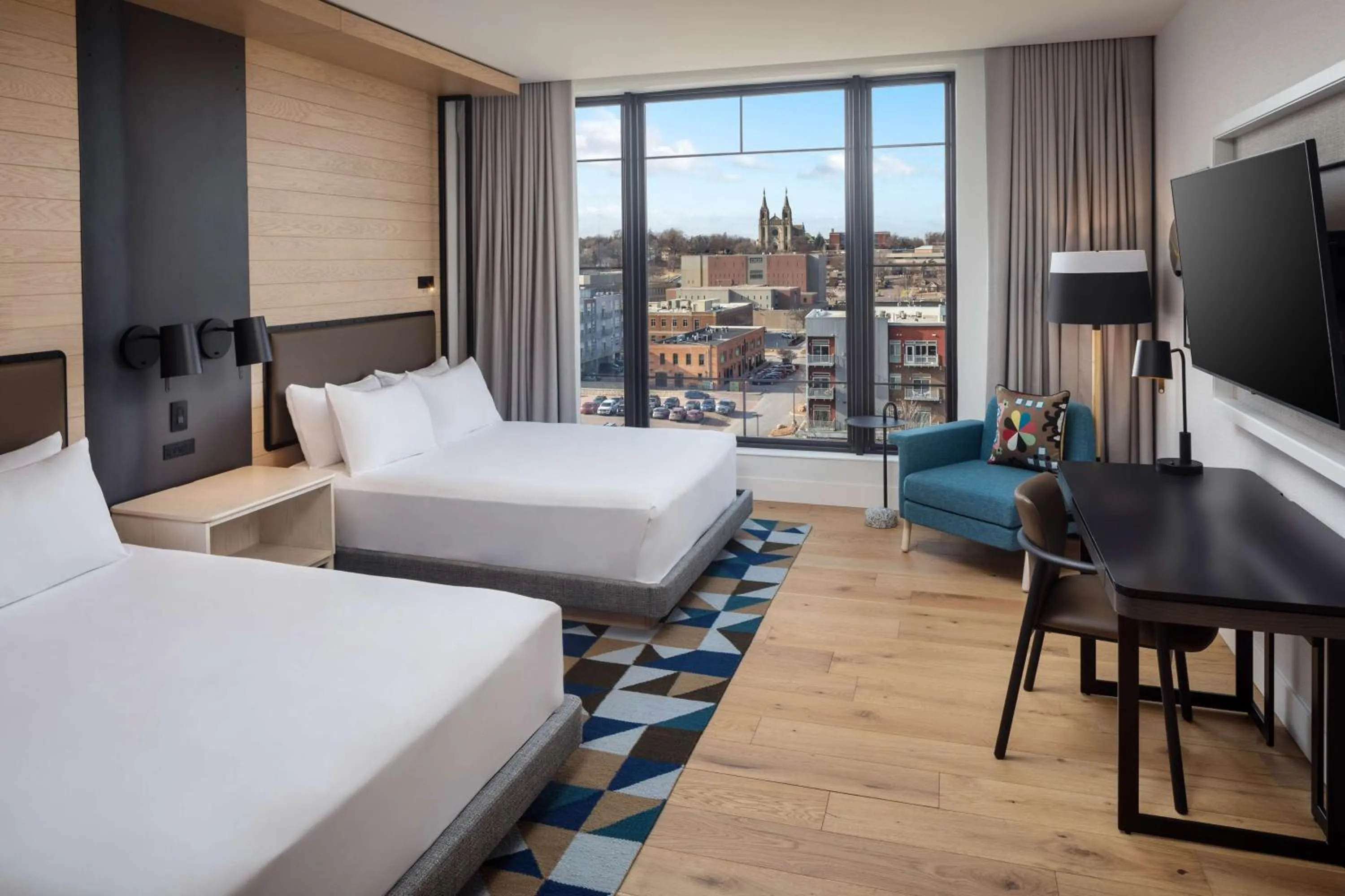 Queen Room with Two Queen Beds, City View and Mobility Accessible Tub in Canopy By Hilton Sioux Falls Downtown