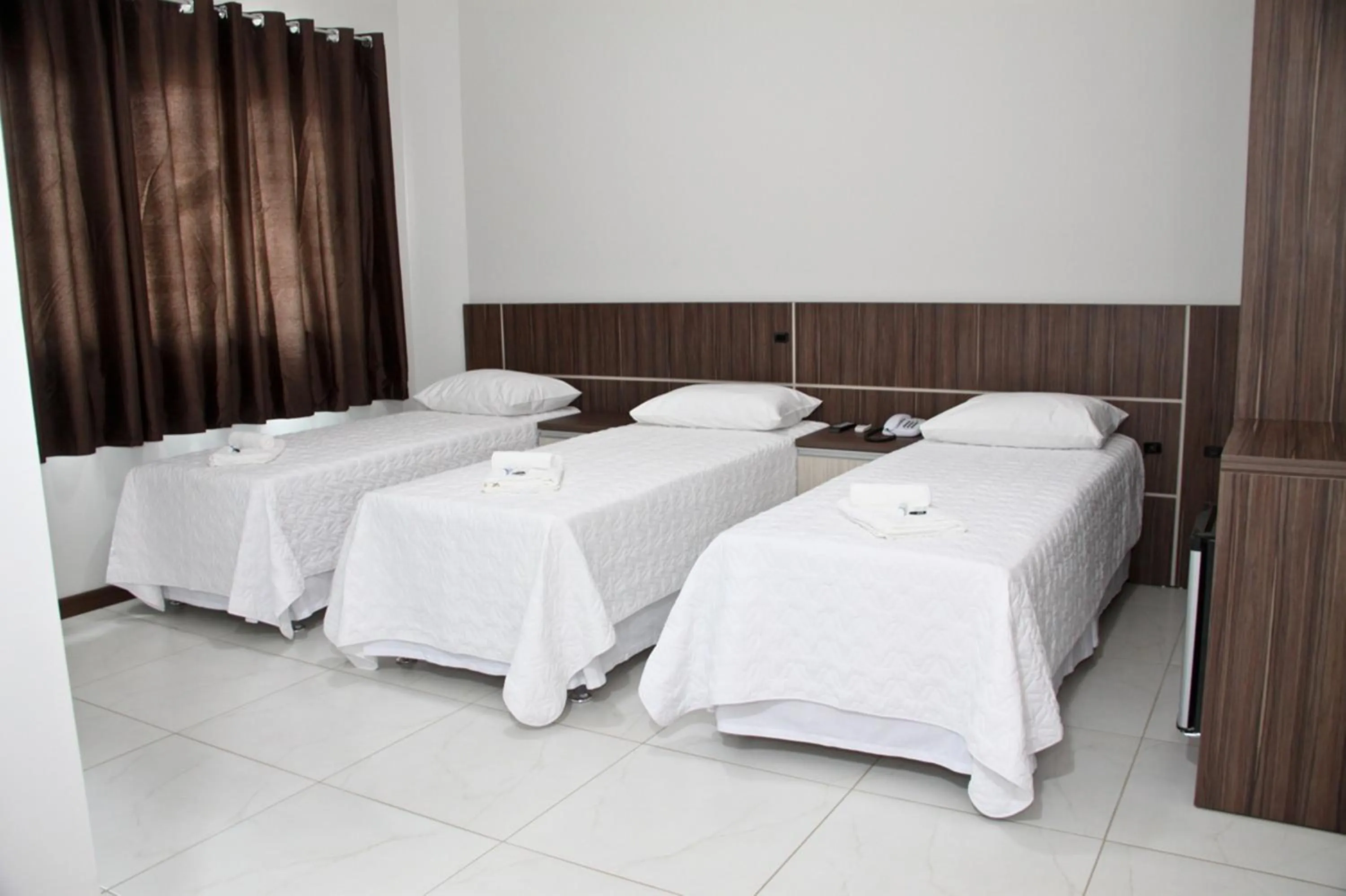 Triple Room ( 3 single beds) in Miotto Executive Hotel