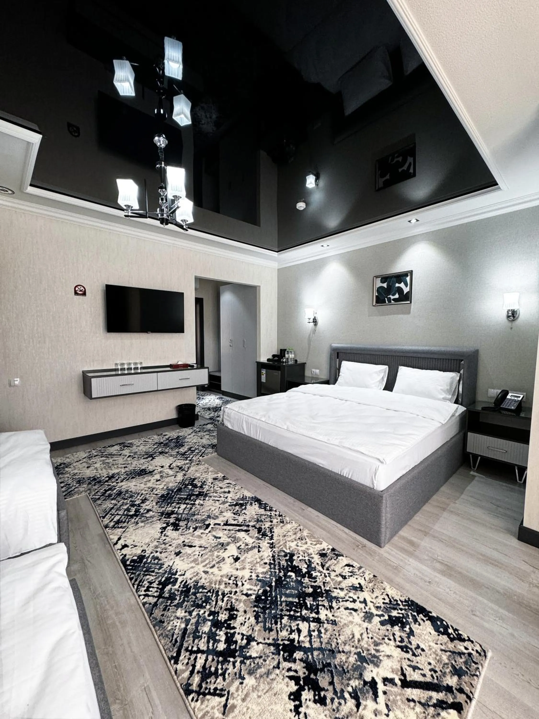 Quadruple Room with Balcony in De Villa Hotel